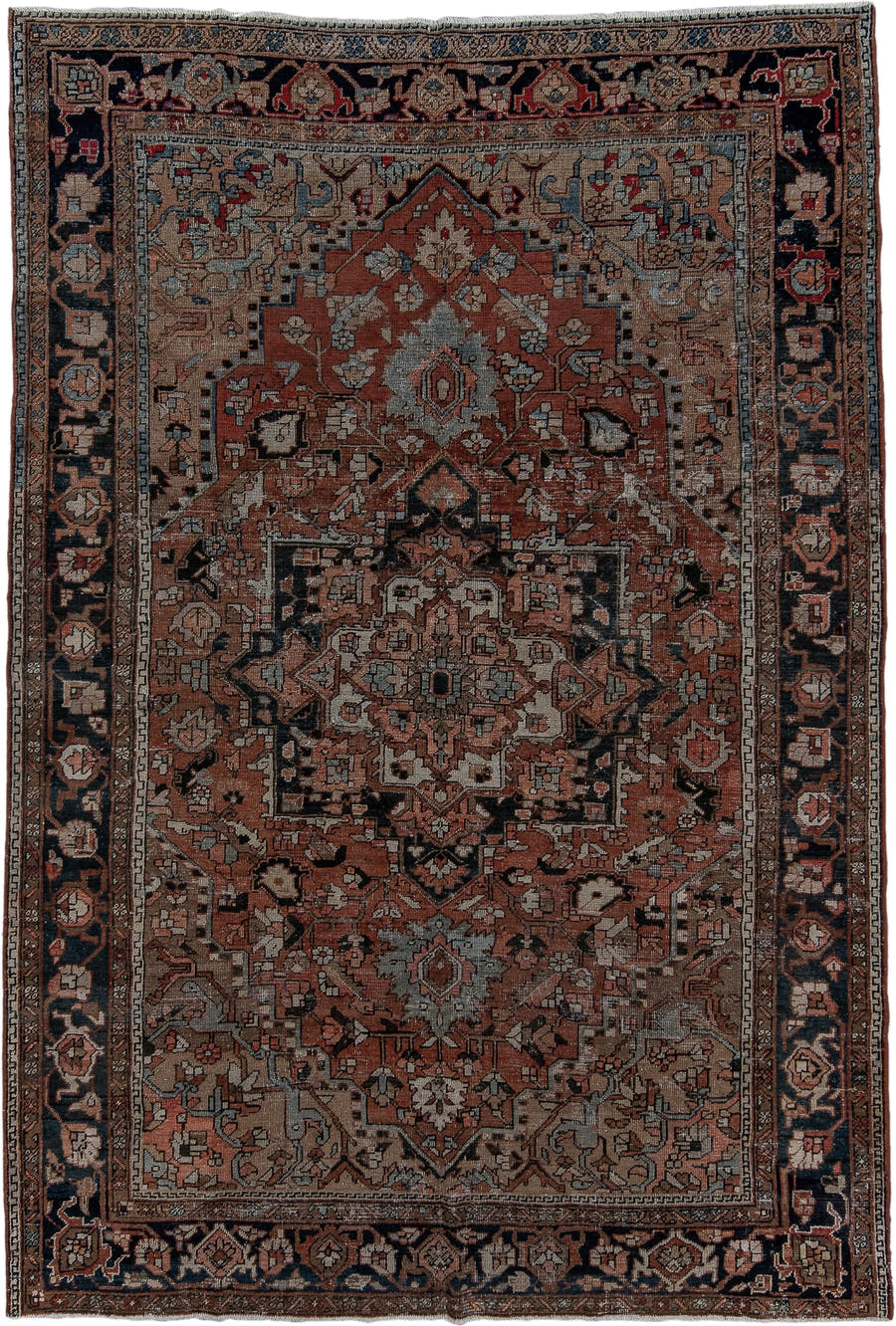 6' x 9' one-of-a-kind handmade antique Heriz medium size rug. Color palette: terra cotta, navy, ivory, slate, taupe, rust