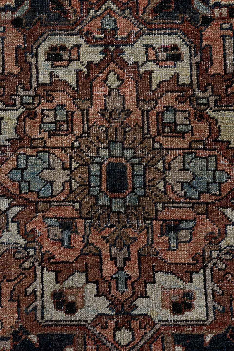 6' x 9' one-of-a-kind handmade antique Heriz medium size rug. Color palette: terra cotta, navy, ivory, slate, taupe, rust