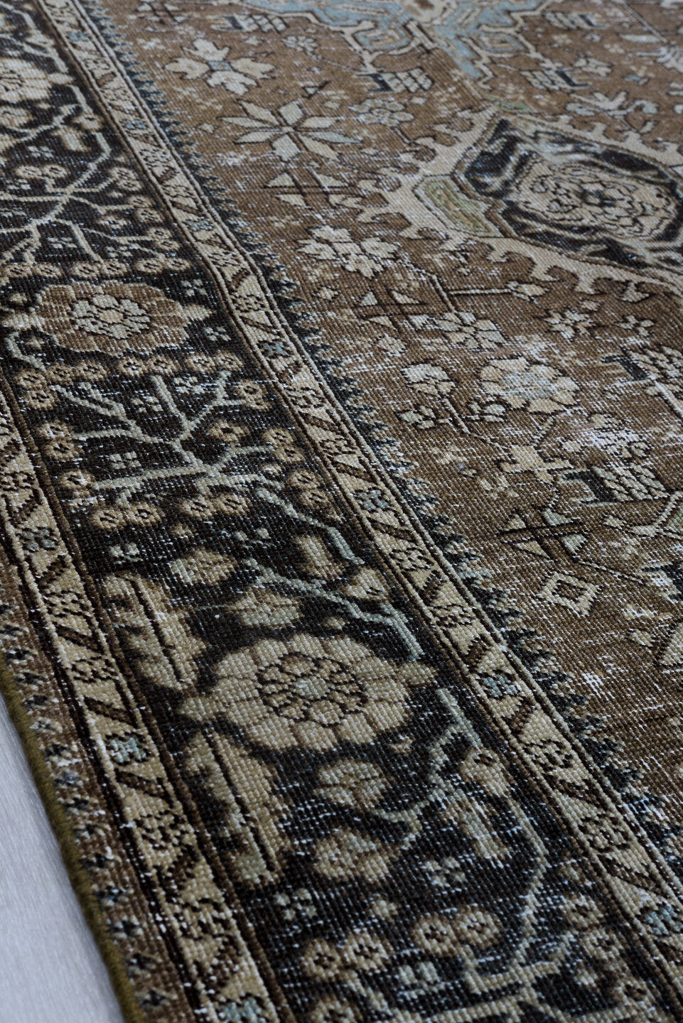 7' x 10' one-of-a-kind handmade antique Karaje large size rug. Color palette: brown, navy, ivory, taupe, sage, aqua