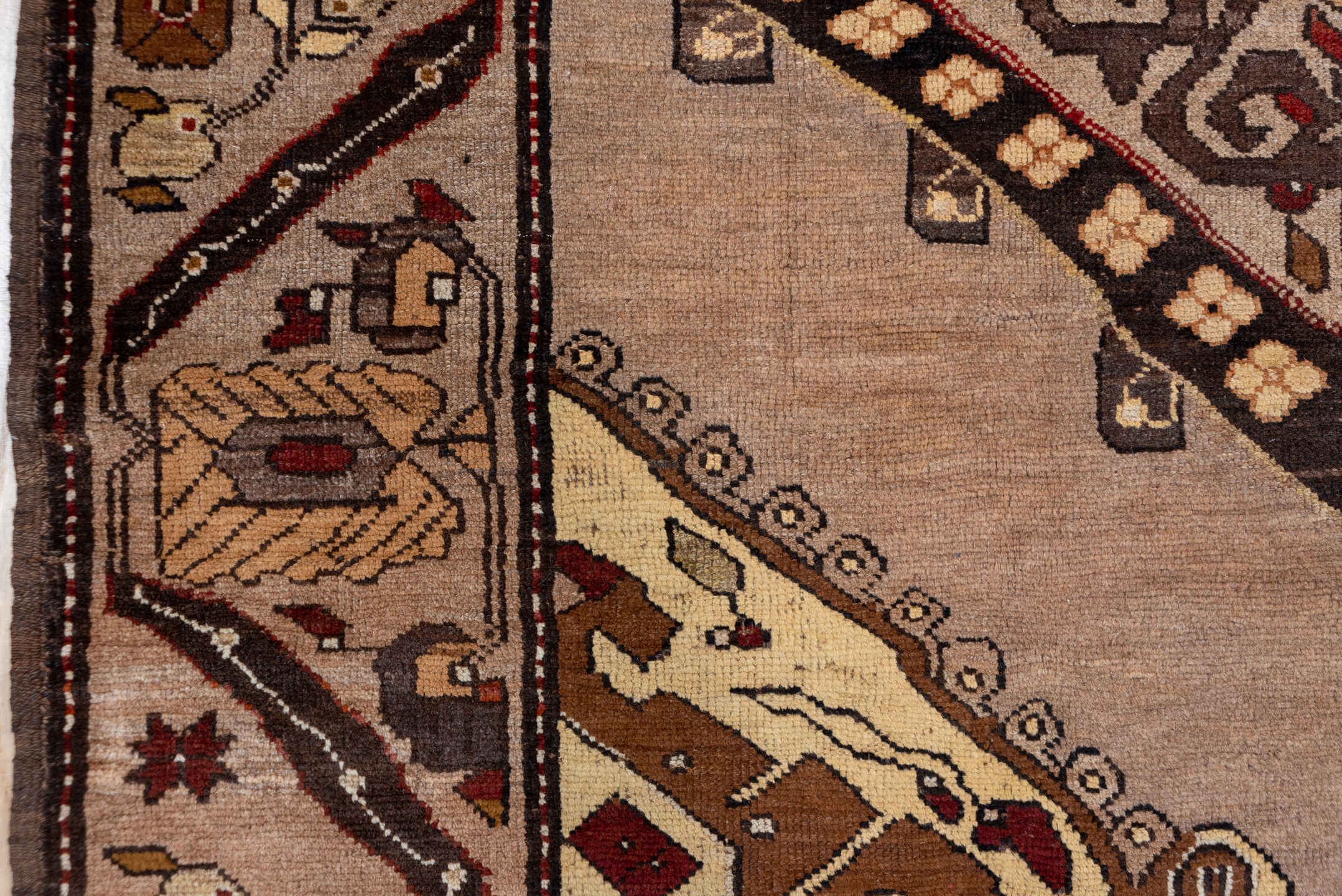 7' x 9' one-of-a-kind handmade vintage Kars rug. Color palette: taupe, brown, ivory, walnut, rust, charcoal, camel, burgundy