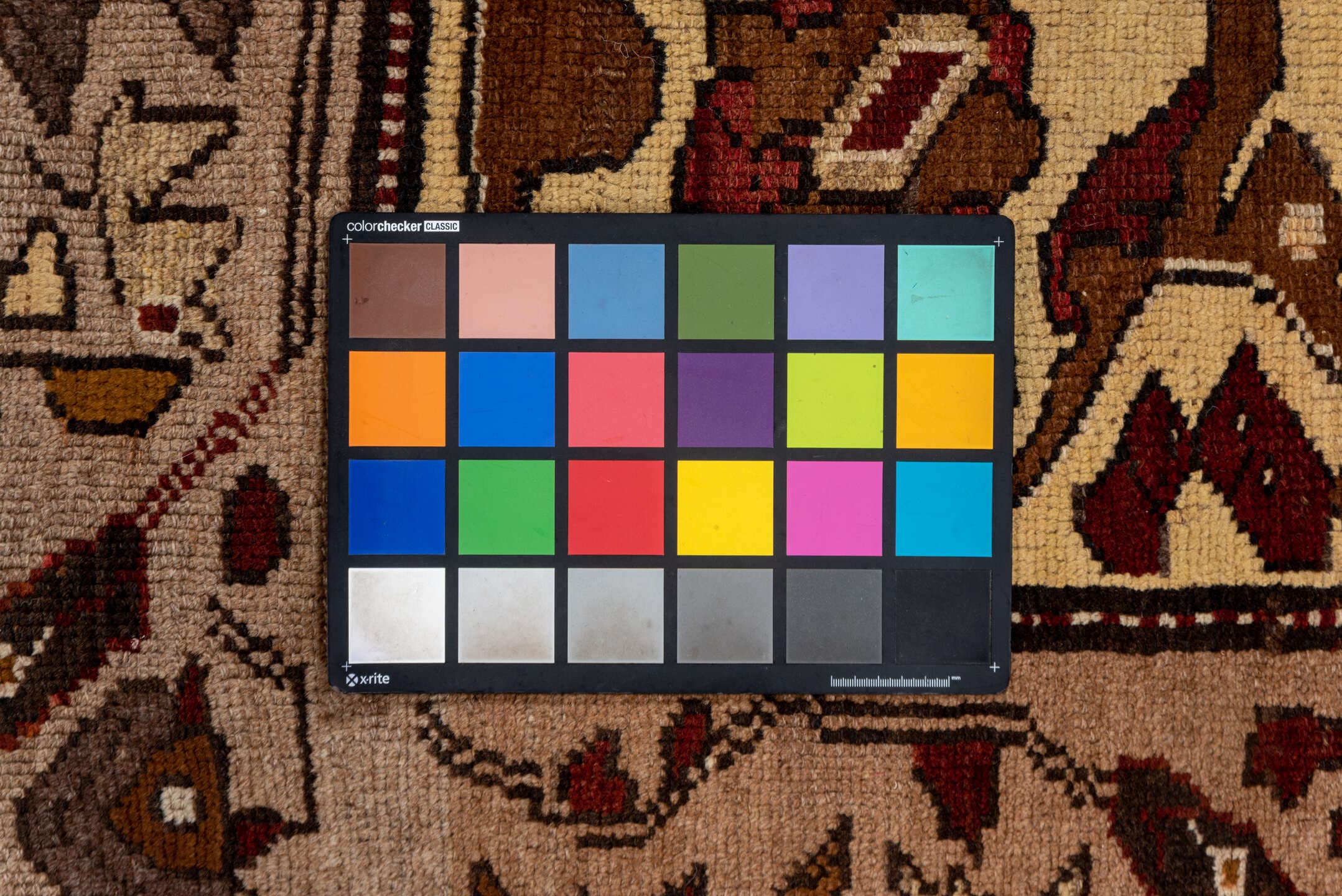 7' x 9' one-of-a-kind handmade vintage Kars rug. Color palette: taupe, brown, ivory, walnut, rust, charcoal, camel, burgundy