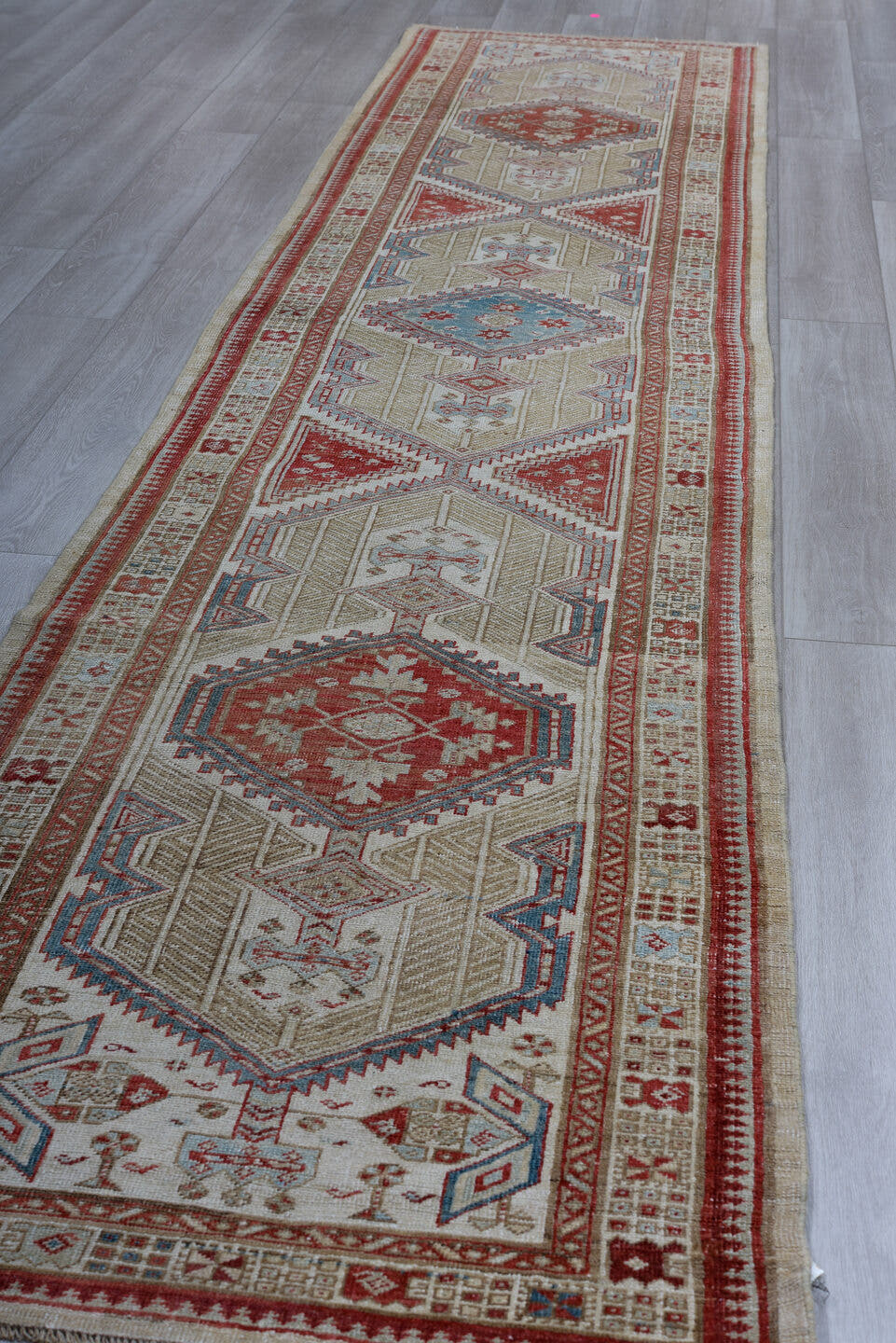 3' x 15' one-of-a-kind handmade vintage Sarab runner rug. Color palette: ivory, rust, brick, indigo, sky_blue, taupe