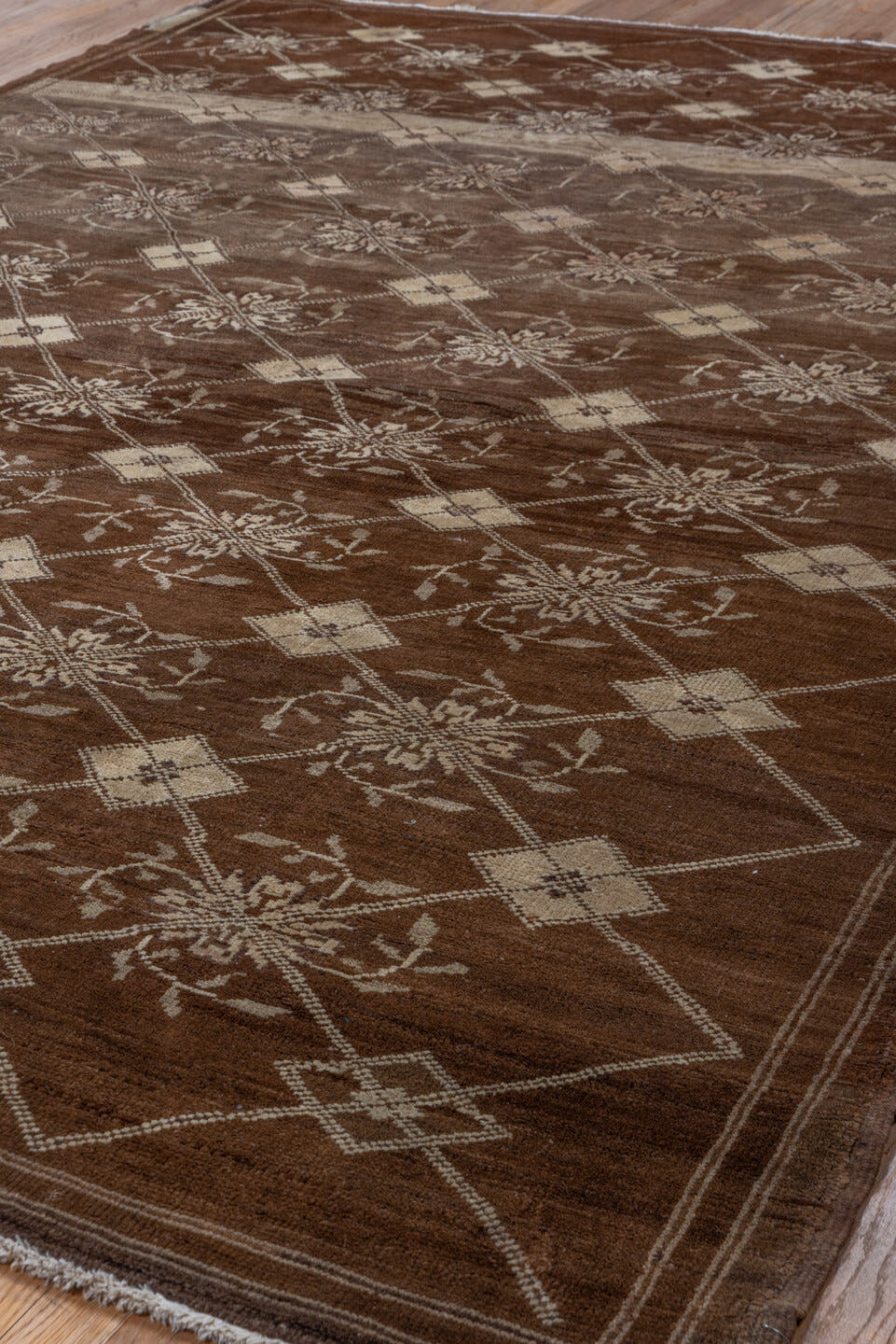 7' x 9' one-of-a-kind handmade vintage Kars rug. Color palette: brown, ivory, taupe, camel, charcoal, beige, gray, black