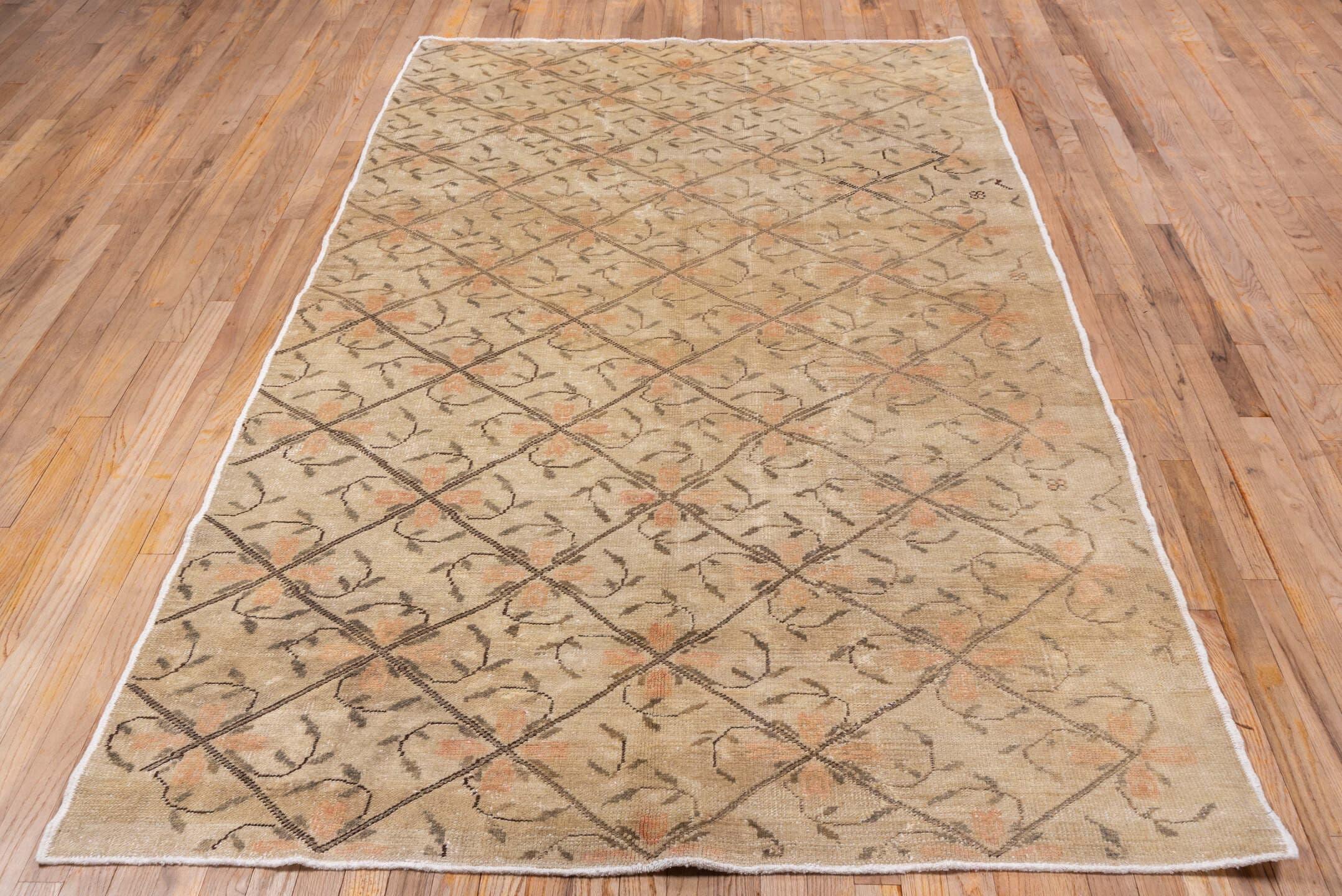 5' x 9' one-of-a-kind handmade vintage Oushak medium size rug. Color palette: beige, taupe, ivory, peach, brown, gray