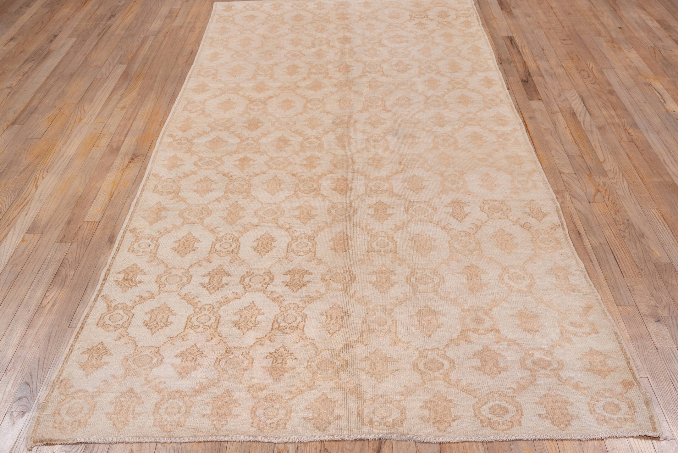 5' x 10' one-of-a-kind handmade vintage Konya medium size rug. Color palette: ivory, blush, peach, taupe, sand, pink