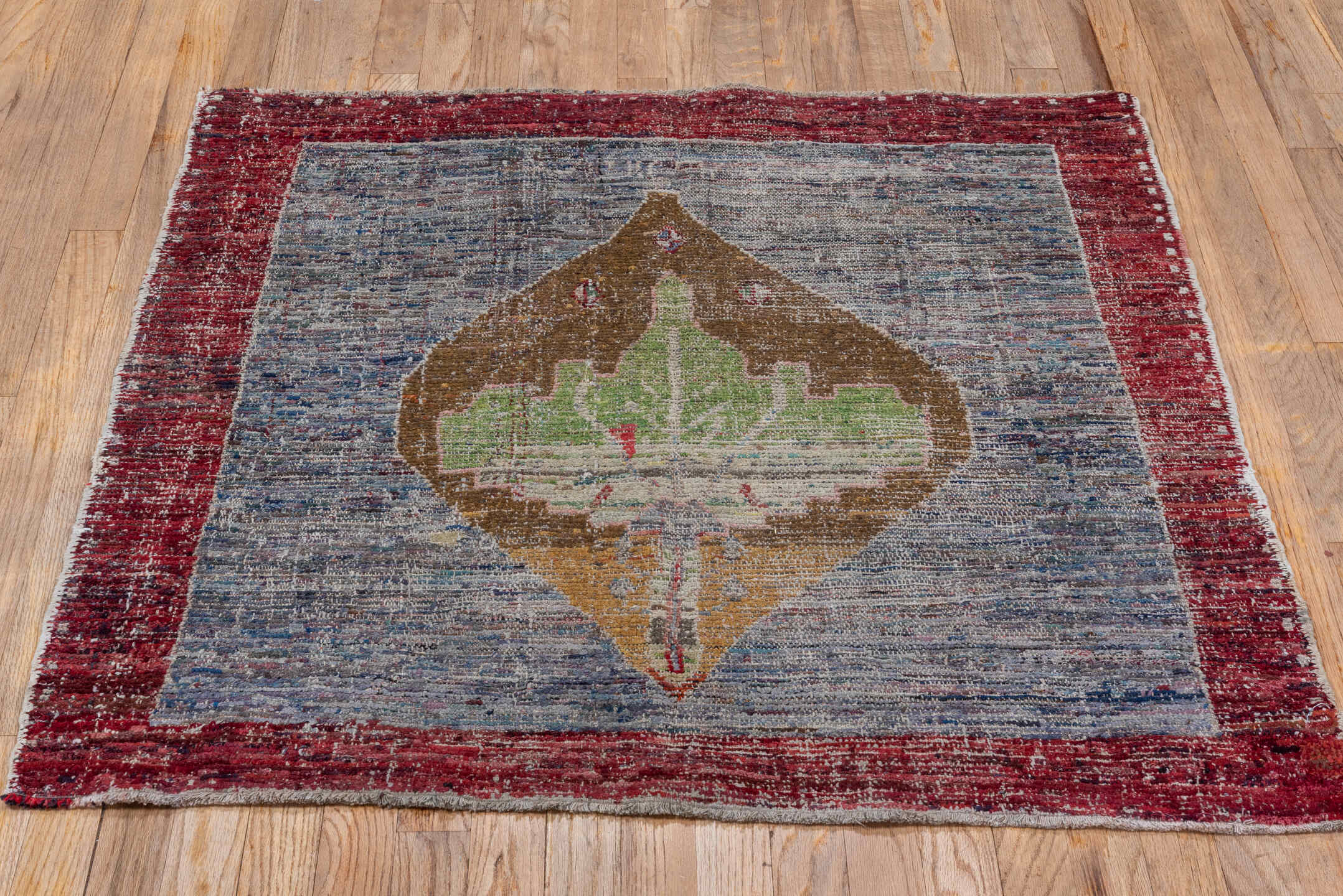 3' x 3' one-of-a-kind handmade vintage Tulu small size rug. Color palette: crimson, ivory, taupe, brown, sage, slate, red