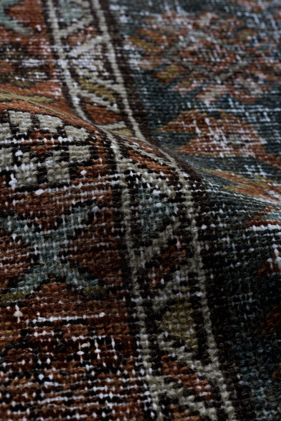 2' x 10' one-of-a-kind handmade vintage Karaje runner rug. Color palette: black, blue, brown, charcoal, gray, light gray