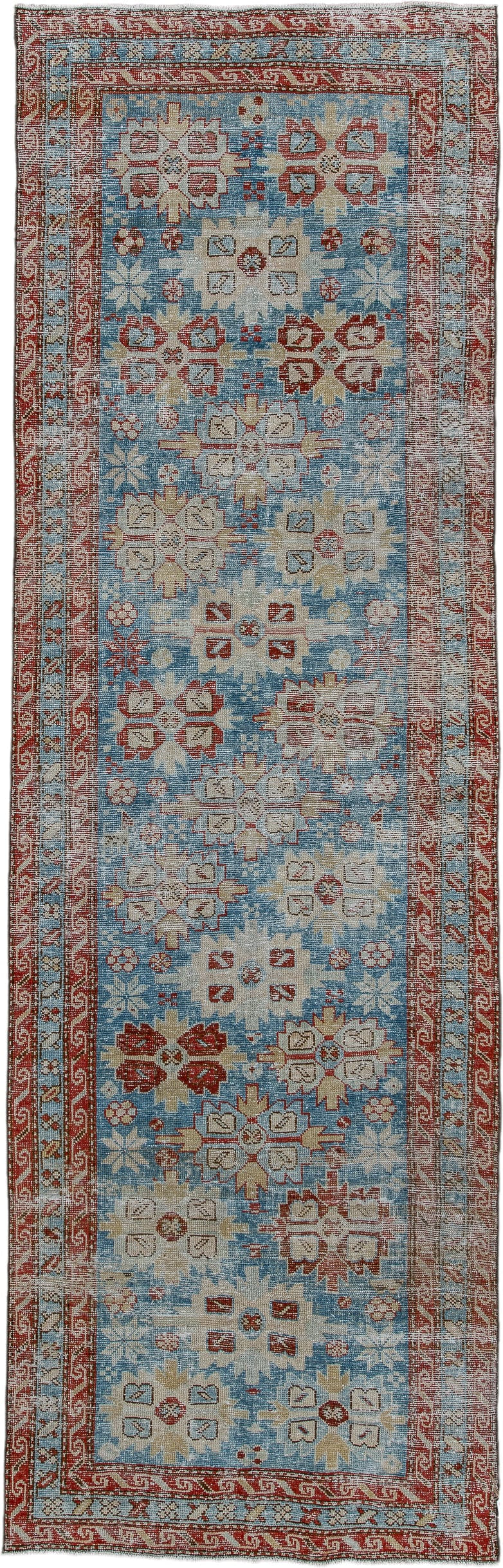 3' x 10' one-of-a-kind handmade antique Heriz runner rug. Color palette: sky blue, rust, ivory, brick, pale blue, cream