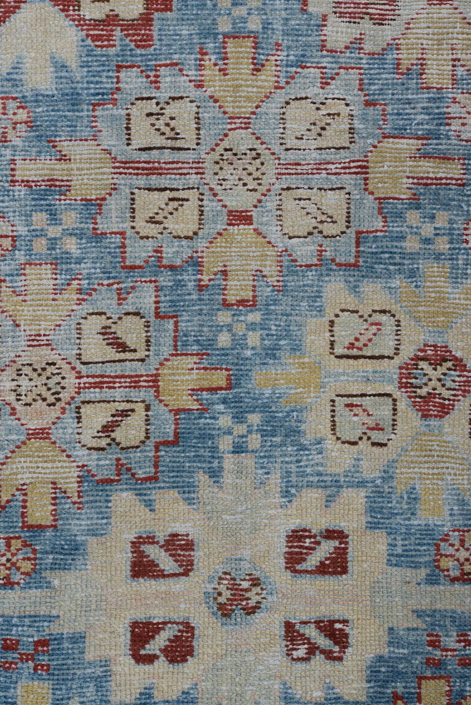 3' x 10' one-of-a-kind handmade antique Heriz runner rug. Color palette: sky blue, rust, ivory, brick, pale blue, cream
