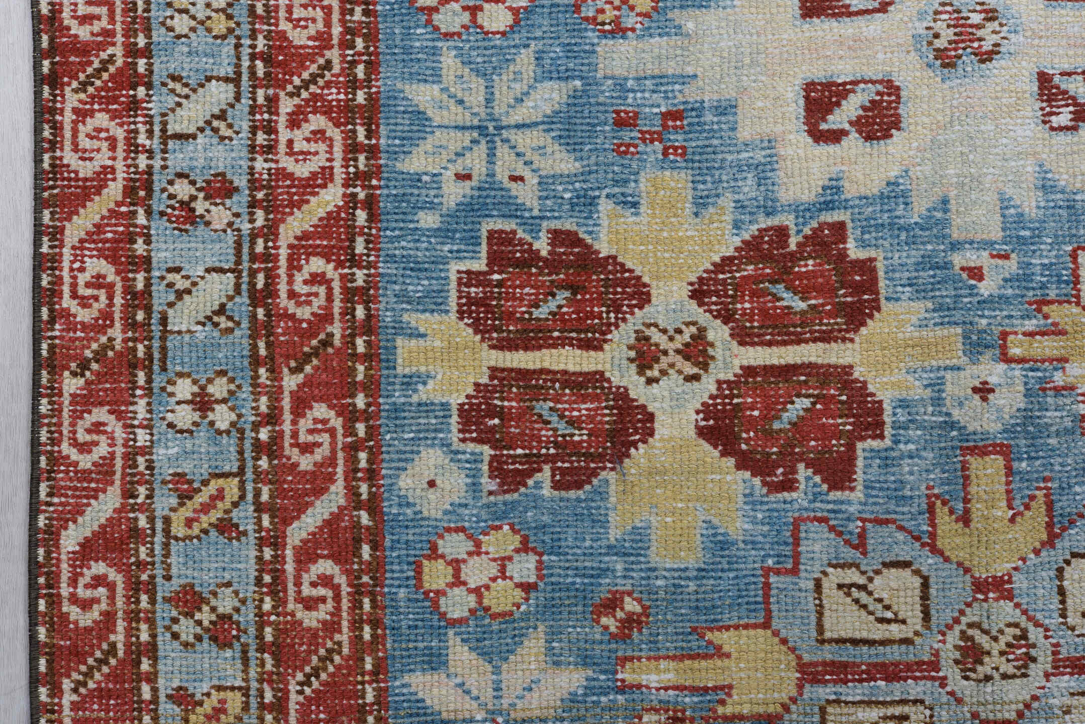 3' x 10' one-of-a-kind handmade antique Heriz runner rug. Color palette: sky blue, rust, ivory, brick, pale blue, cream