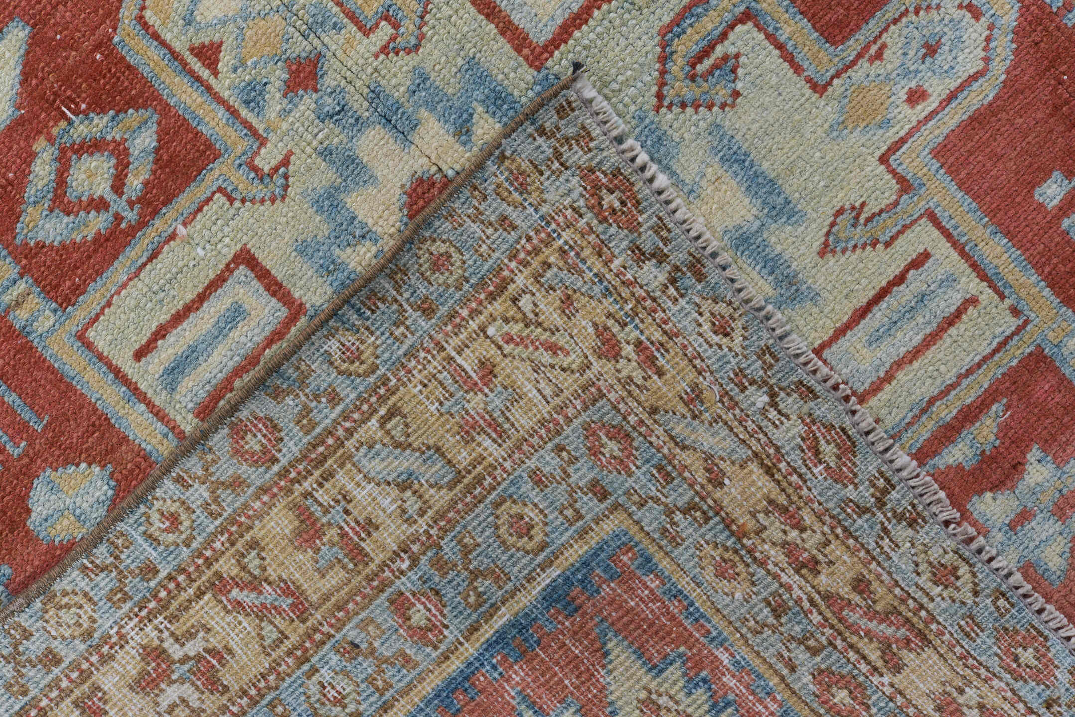 3' x 14' one-of-a-kind handmade antique Heriz runner rug. Color palette: terra cotta, ivory, sky blue, camel, slate, rust
