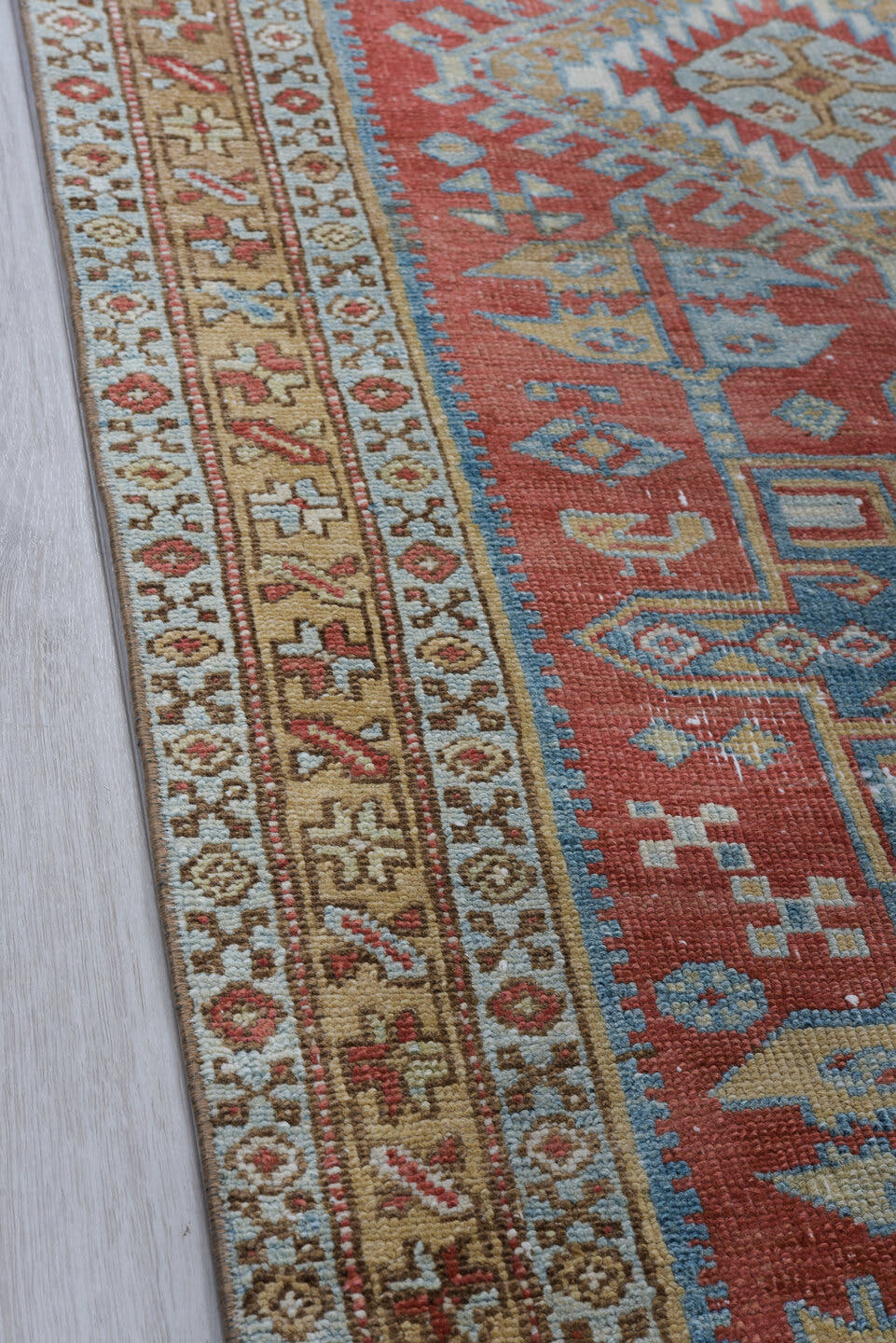 3' x 14' one-of-a-kind handmade antique Heriz runner rug. Color palette: terra cotta, ivory, sky blue, camel, slate, rust