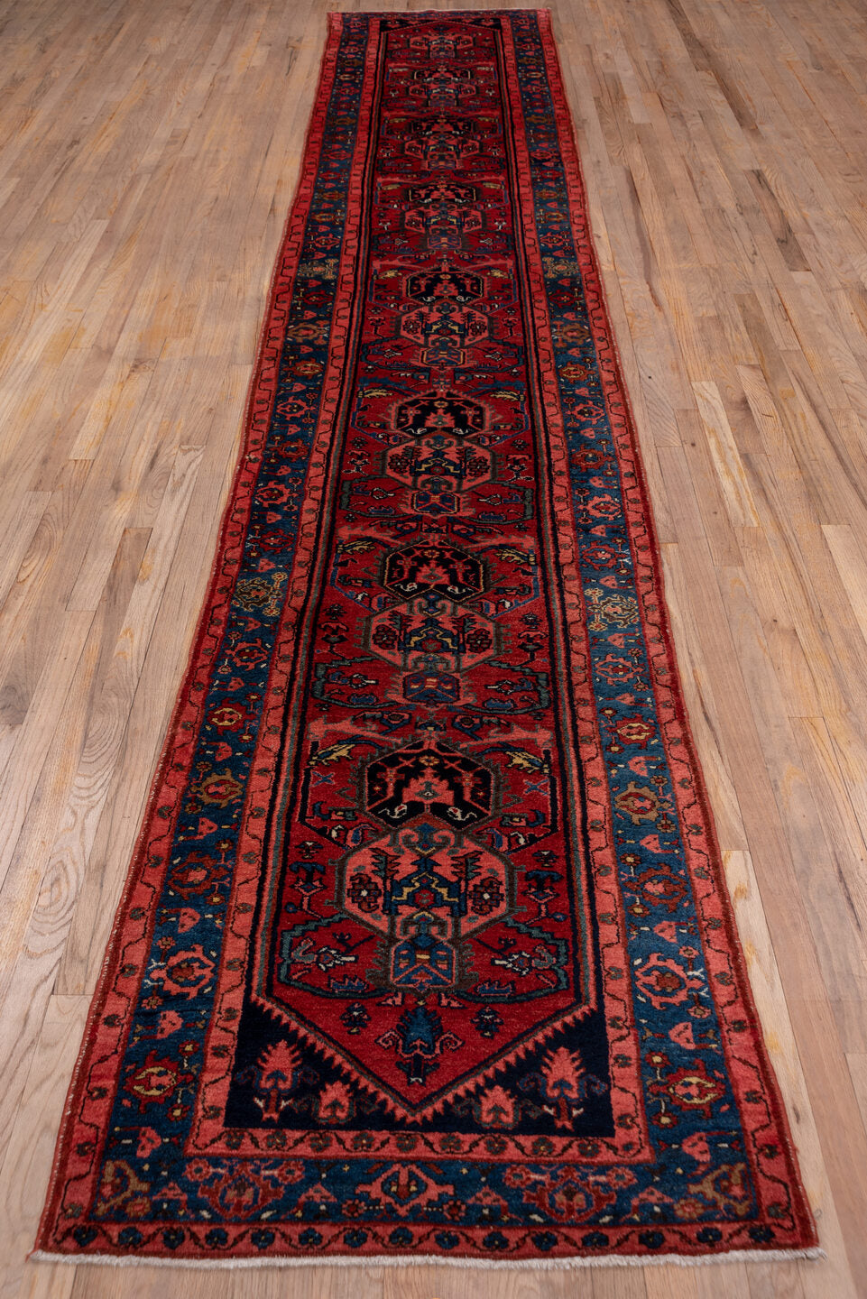 2' x 16' one-of-a-kind handmade vintage Malayer runner rug. Color palette: rust, navy, crimson, indigo, coral, ivory
