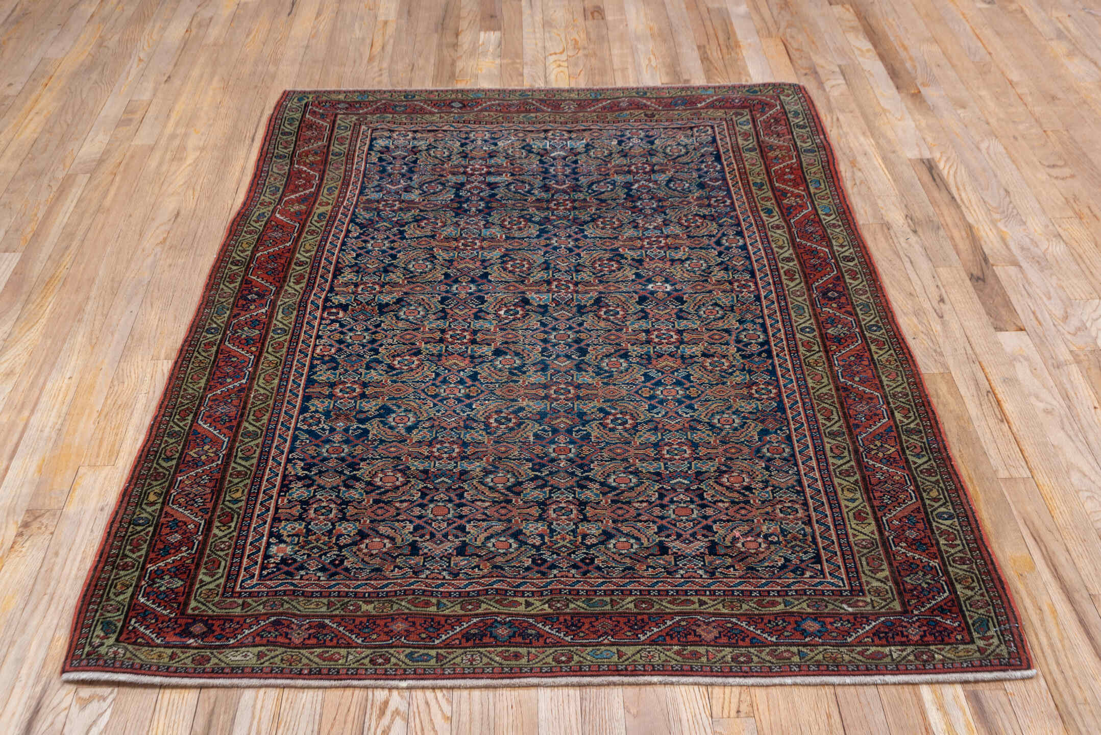 4' x 6' one-of-a-kind handmade antique Malayer small size rug. Color palette: navy, rust, ivory, camel, rose, slate, blue