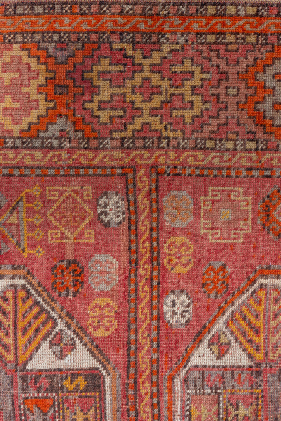 4' x 11' one-of-a-kind handmade vintage Oushak runner rug. Color palette: brown, maroon, pink, red, sienna