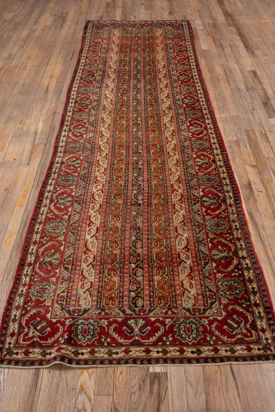 3' x 11' one-of-a-kind handmade vintage Sivas runner rug. Color palette: rust, ivory, terra cotta, slate, camel, rose, navy