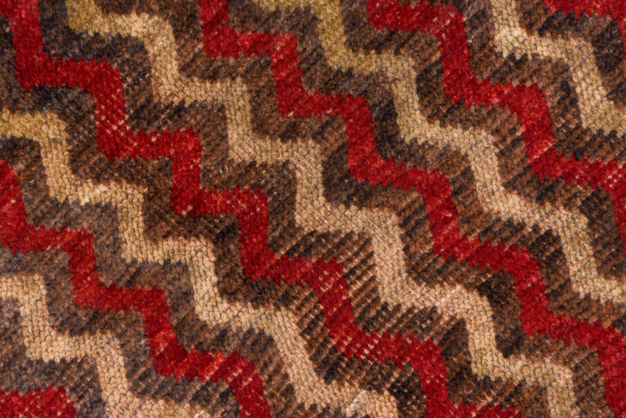 4' x 12' one-of-a-kind handmade vintage Tulu runner rug. Color palette: brown, red, taupe, charcoal, beige, gray, black