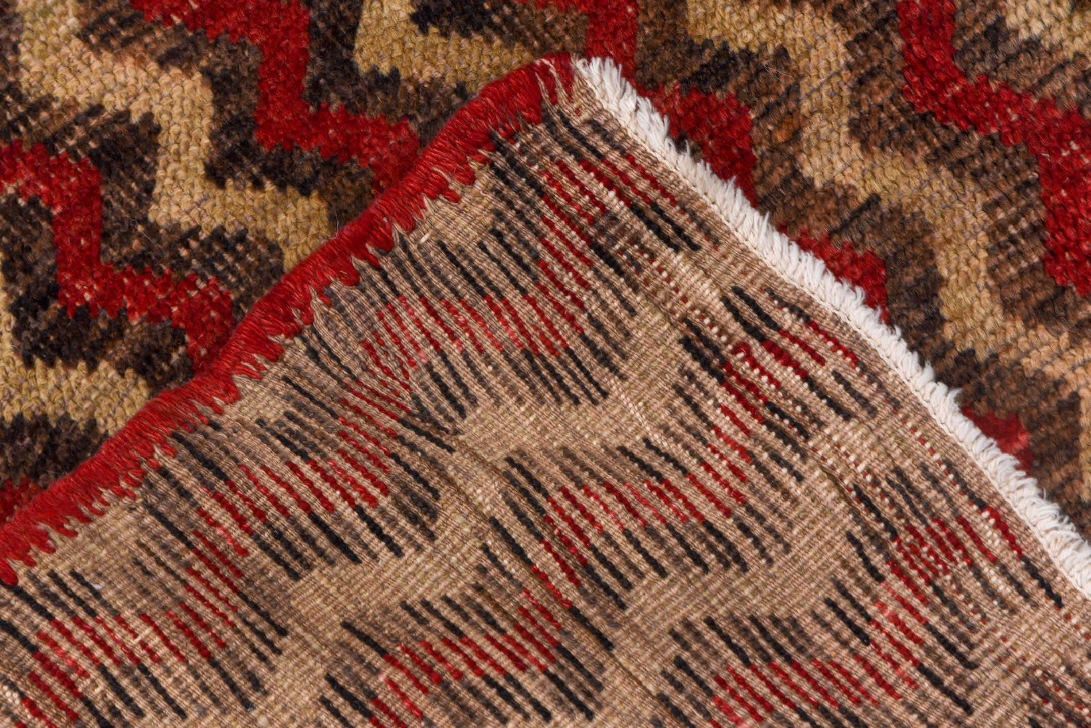 4' x 12' one-of-a-kind handmade vintage Tulu runner rug. Color palette: brown, red, taupe, charcoal, beige, gray, black