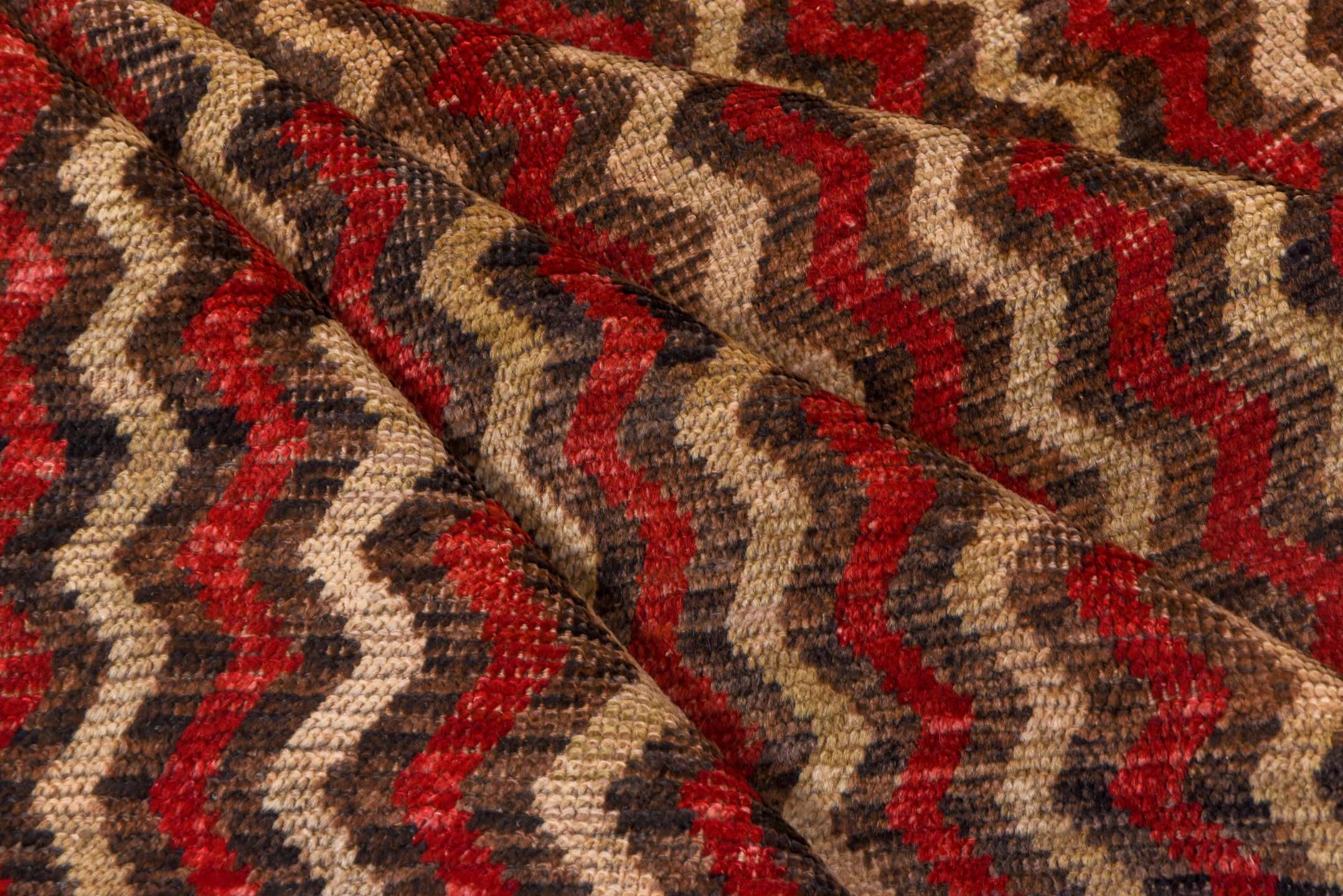 4' x 12' one-of-a-kind handmade vintage Tulu runner rug. Color palette: brown, red, taupe, charcoal, beige, gray, black
