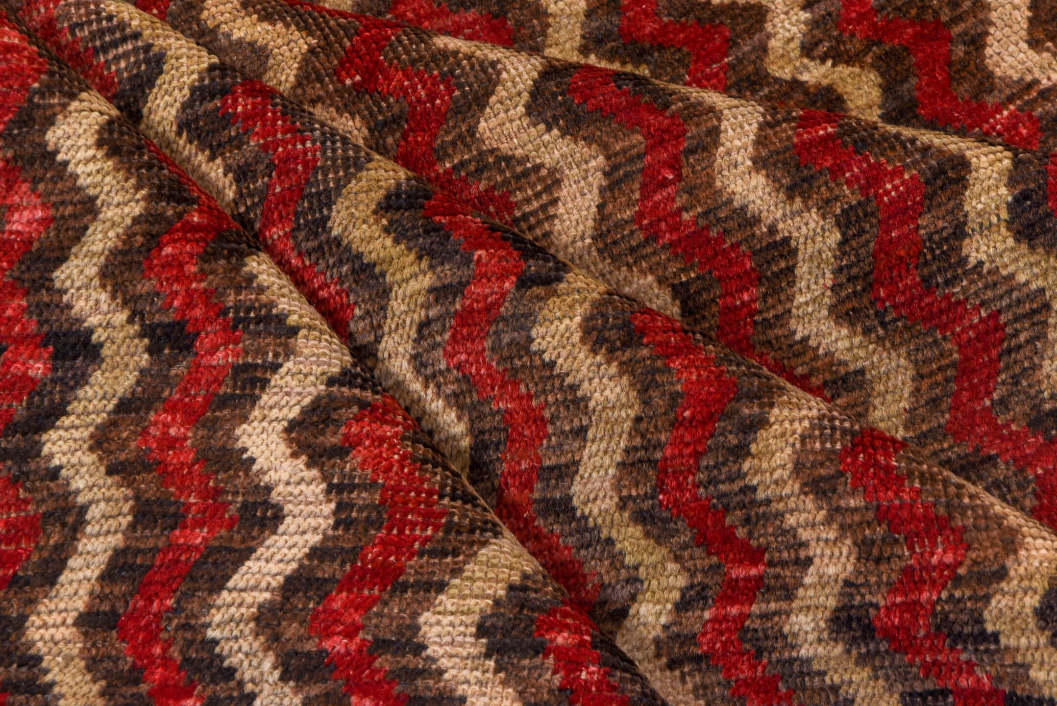 4' x 12' one-of-a-kind handmade vintage Tulu runner rug. Color palette: brown, red, taupe, charcoal, beige, gray, black