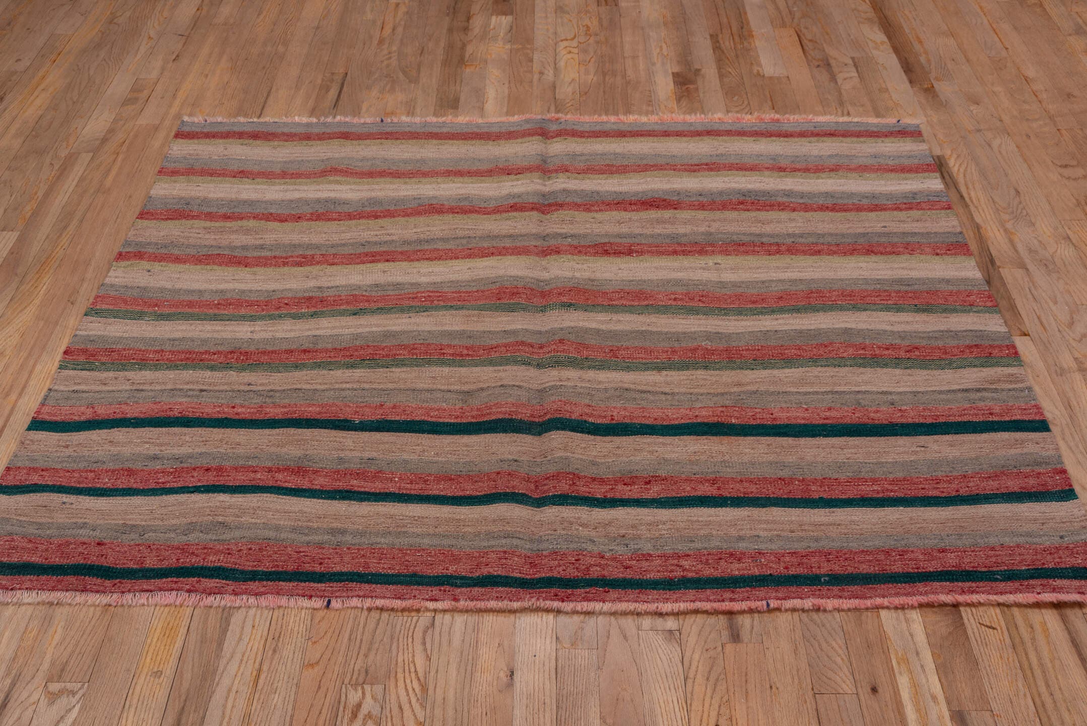5' x 5' one-of-a-kind handmade vintage Kilim rug. Color palette: taupe, blush, rust, sage, teal, gray, beige, pink