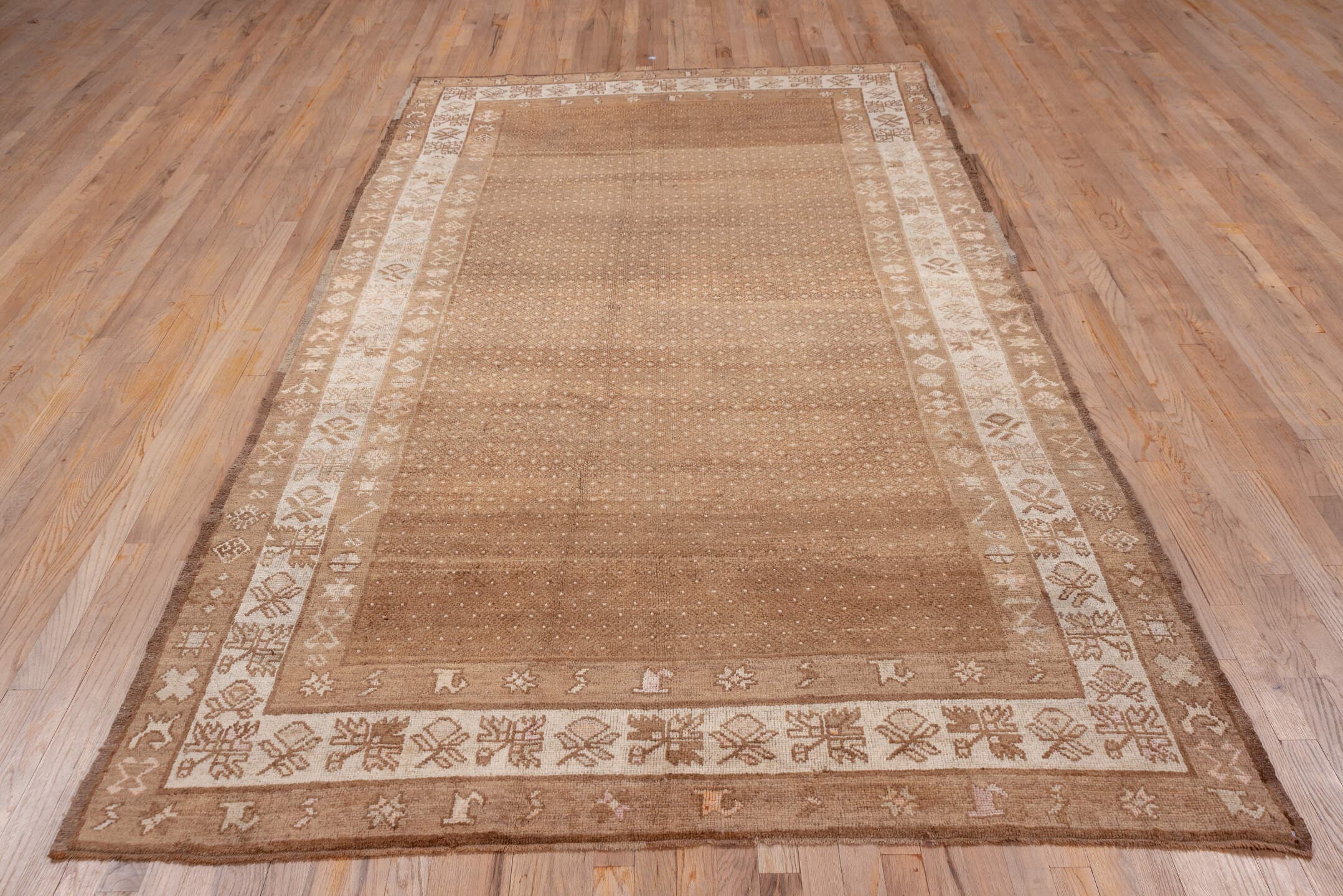 5' x 10' one-of-a-kind handmade vintage Oushak medium size rug. Color palette: camel, taupe, beige, ivory, sand, brown, gray