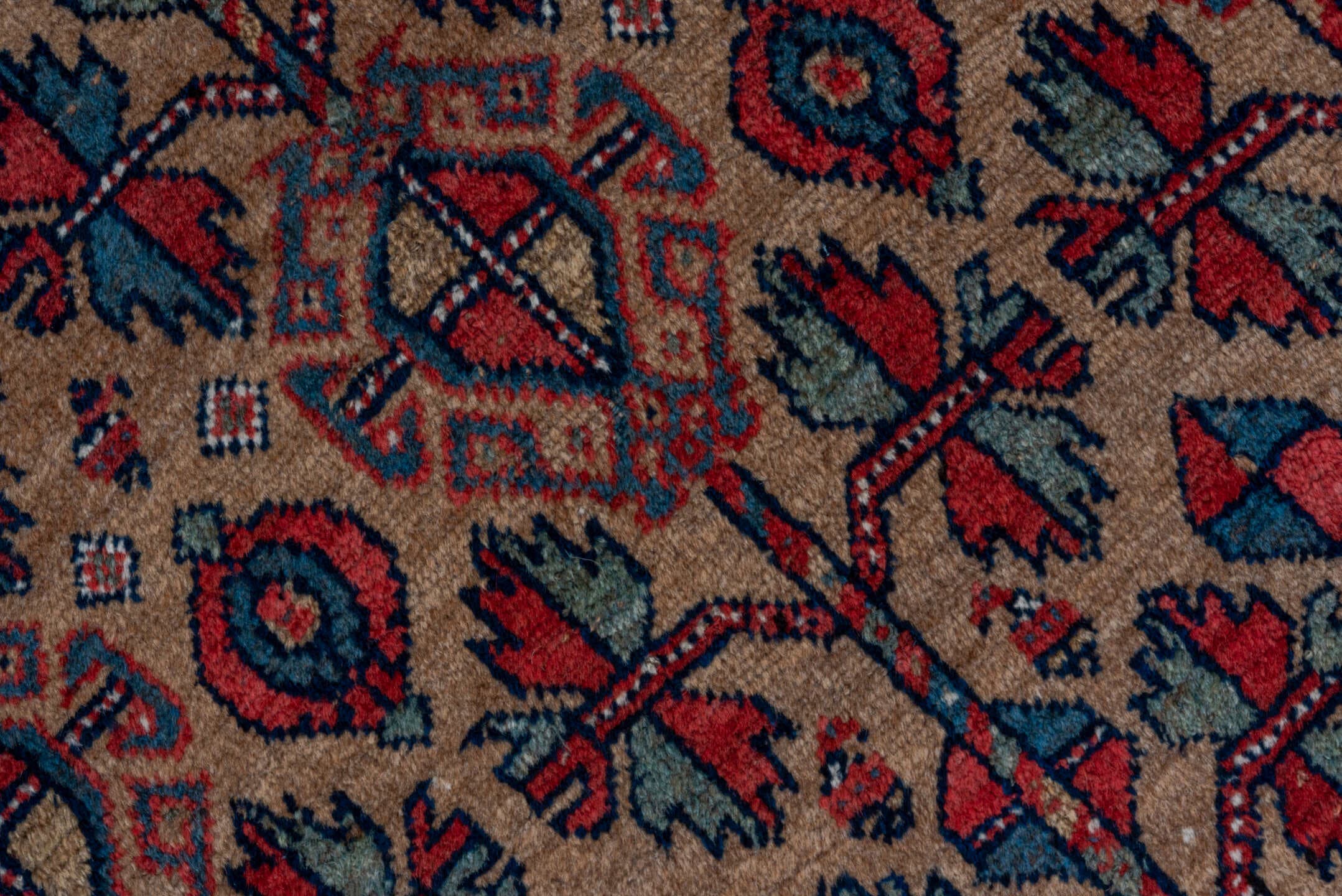 3' x 5' one-of-a-kind handmade vintage Kurd small size rug. Color palette: rust, camel, indigo, ivory, crimson, charcoal