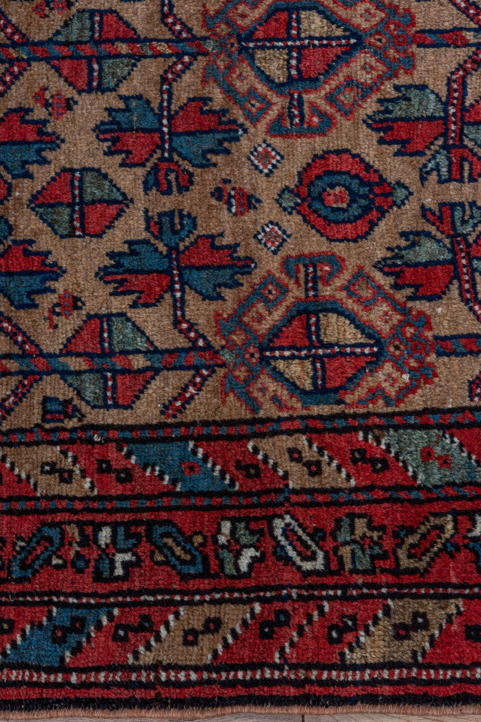 3' x 5' one-of-a-kind handmade vintage Kurd small size rug. Color palette: rust, camel, indigo, ivory, crimson, charcoal