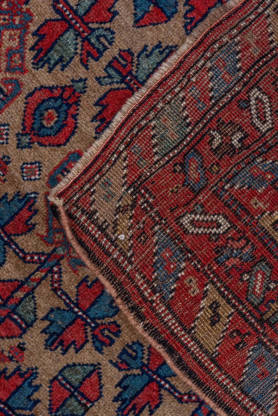 3' x 5' one-of-a-kind handmade vintage Kurd small size rug. Color palette: rust, camel, indigo, ivory, crimson, charcoal