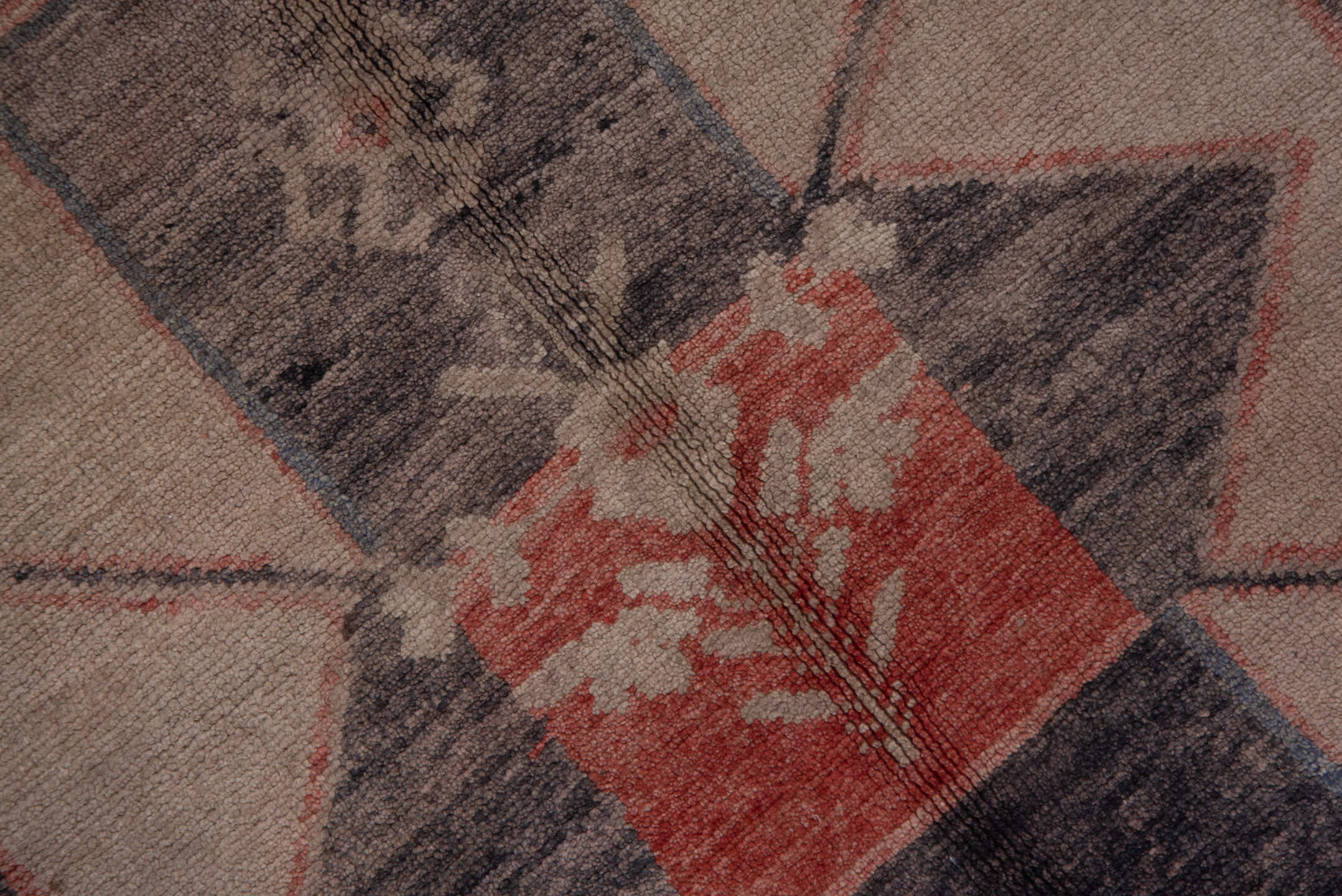 4' x 9' one-of-a-kind handmade vintage Oushak runner rug. Color palette: black, brown, charcoal, gray, pink, red, redwood