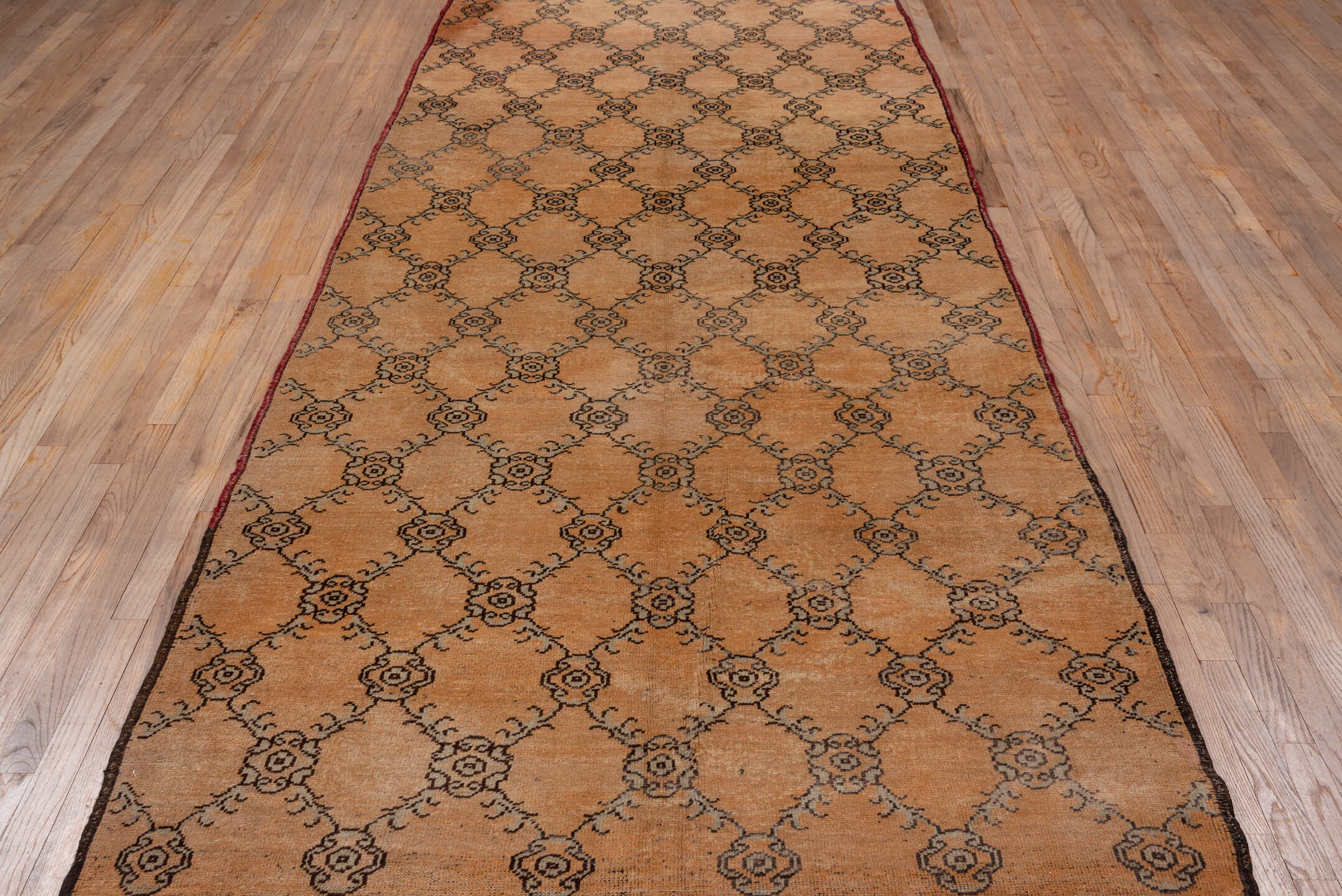 5' x 11' one-of-a-kind handmade vintage Konya runner rug. Color palette: camel, taupe, charcoal, rust, beige, gray, black