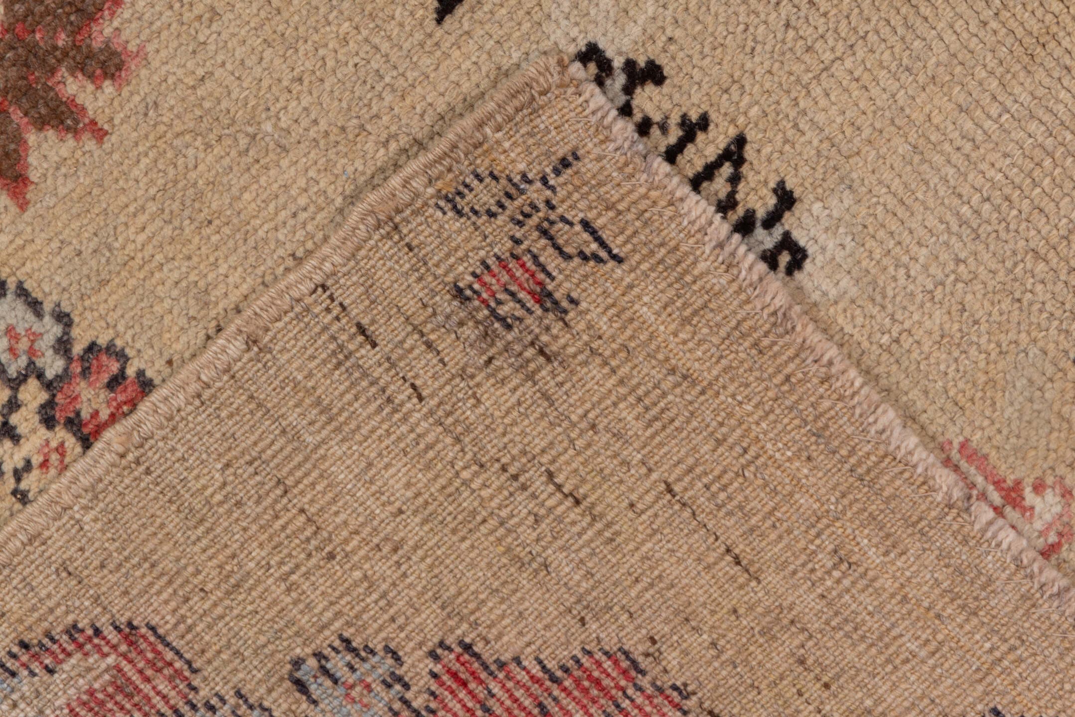 5' x 11' one-of-a-kind handmade vintage Konya runner rug. Color palette: camel, rust, ivory, charcoal, rose, taupe, beige