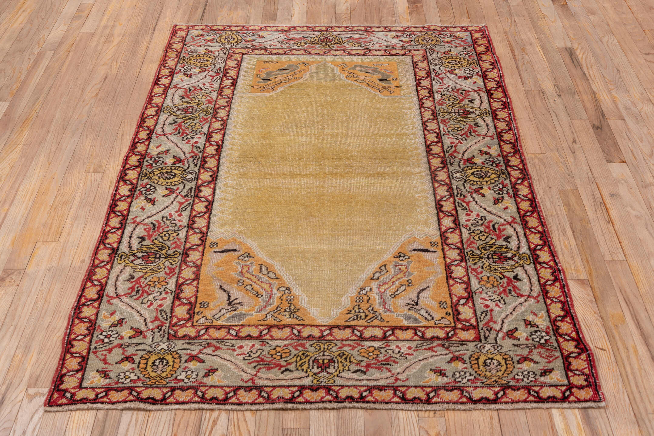 4' x 5' one-of-a-kind handmade vintage Oushak small size rug. Color palette: gold, ivory, rust, camel, charcoal, rose