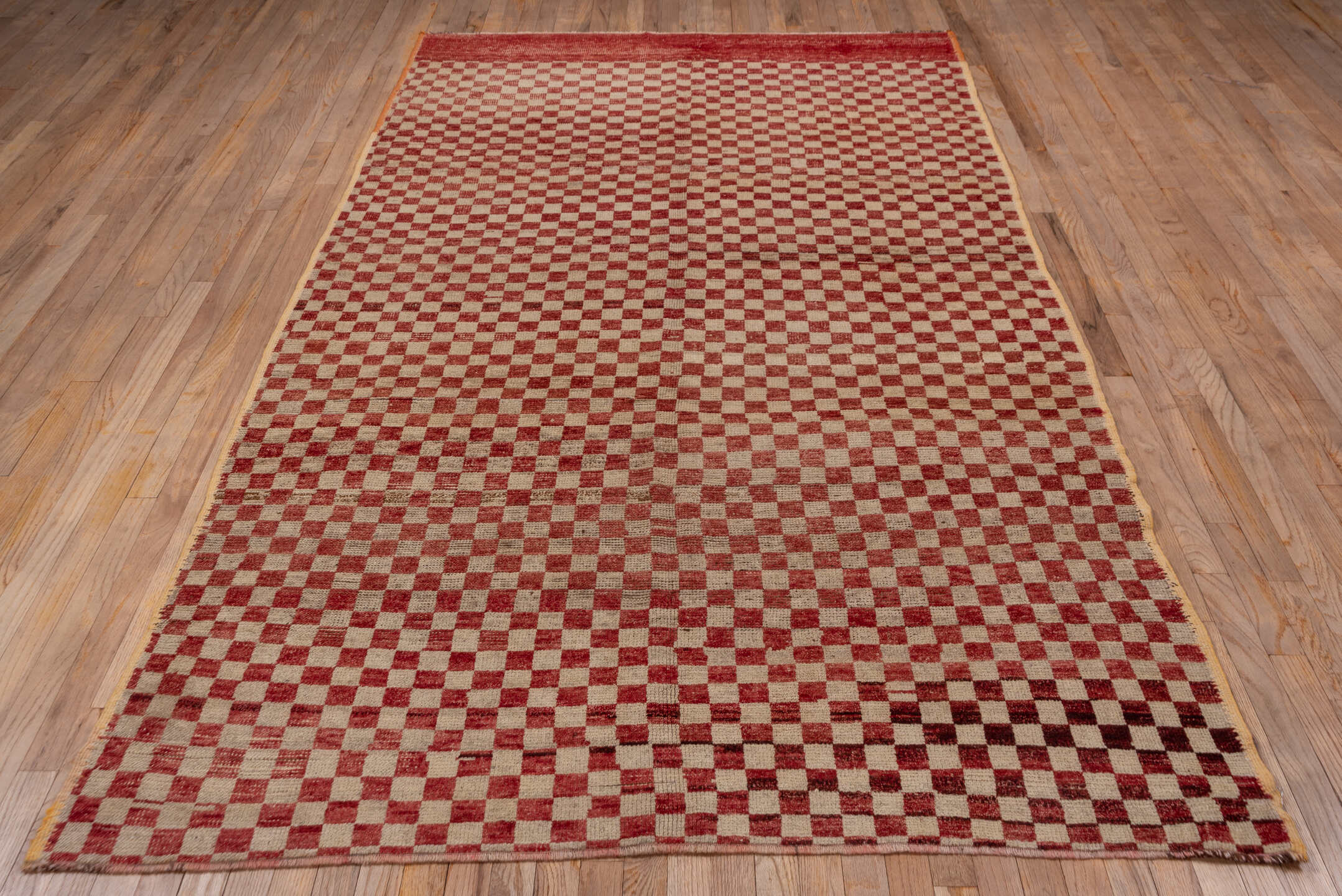 5' x 10' one-of-a-kind handmade vintage Tulu medium size rug. Color palette: brown, gray, light gray, pink, red