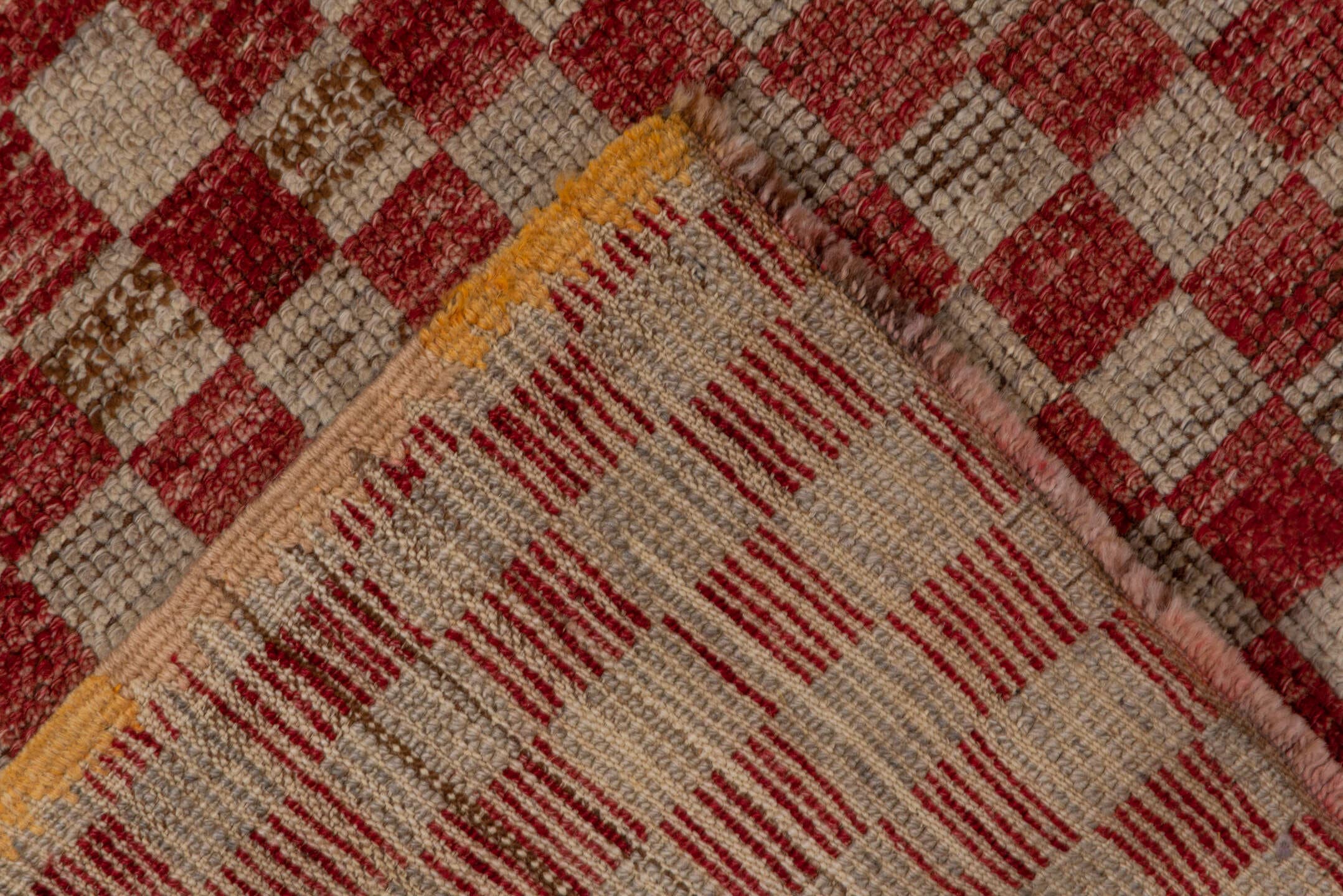 5' x 10' one-of-a-kind handmade vintage Tulu medium size rug. Color palette: red, ivory, rose, brick, cream, pink, brown