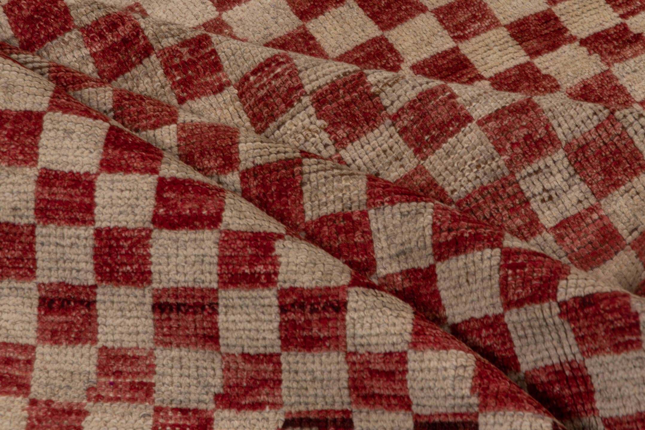 5' x 10' one-of-a-kind handmade vintage Tulu medium size rug. Color palette: red, ivory, rose, brick, cream, pink, brown
