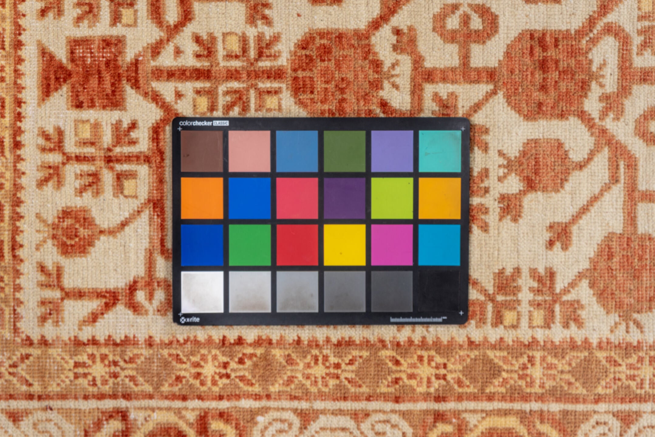 3' x 16' one-of-a-kind handmade vintage Khotan runner rug. Color palette: brown, off-white, orange, pink, snow, white