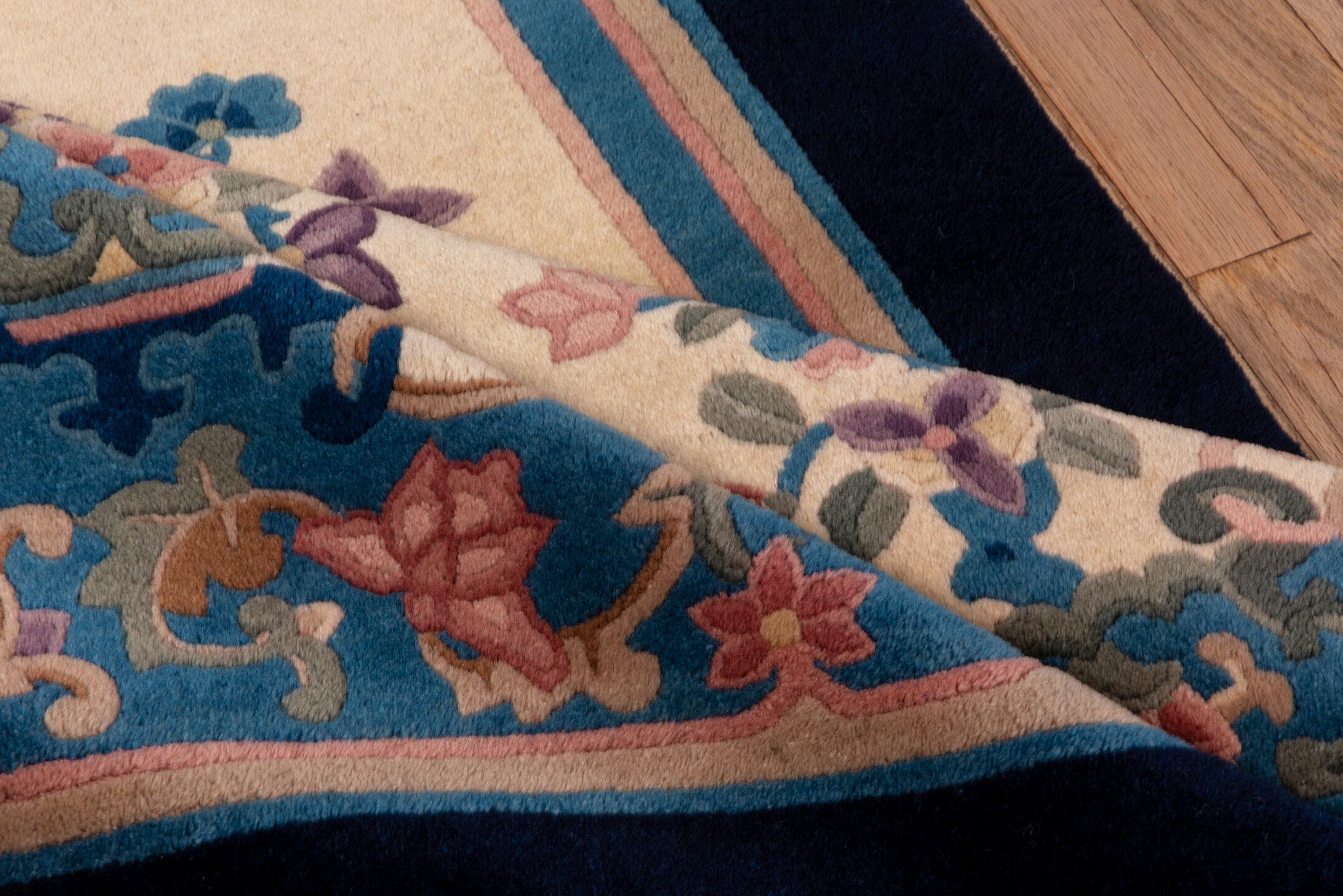 4' x 5' one-of-a-kind handmade vintage Chinese small size rug. Color palette: ivory, navy, blue, rose, sage, lavender, taupe
