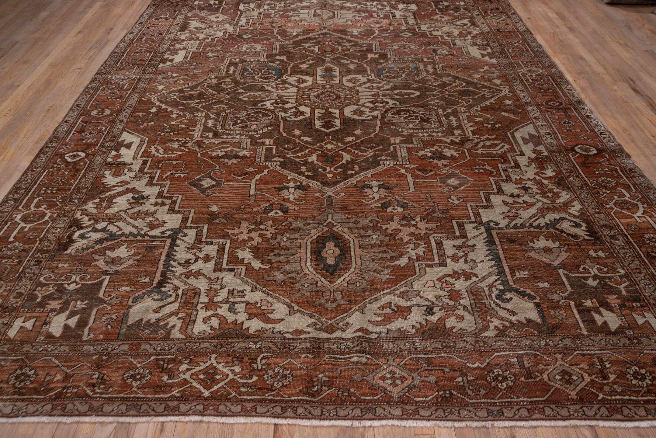 9' x 11' one-of-a-kind handmade vintage Serapi large size rug. Color palette: rust, brown, ivory, terra cotta, taupe