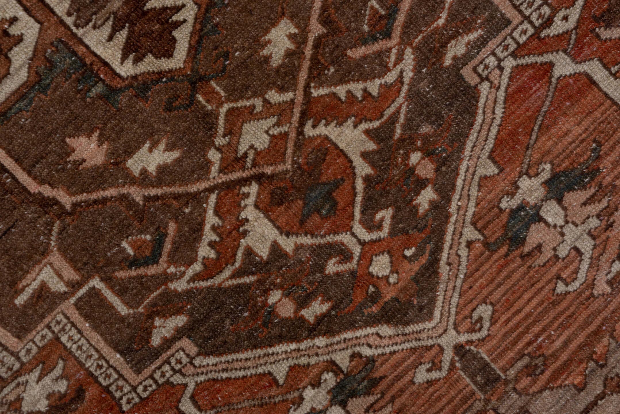 9' x 11' one-of-a-kind handmade vintage Serapi large size rug. Color palette: rust, brown, ivory, terra cotta, taupe