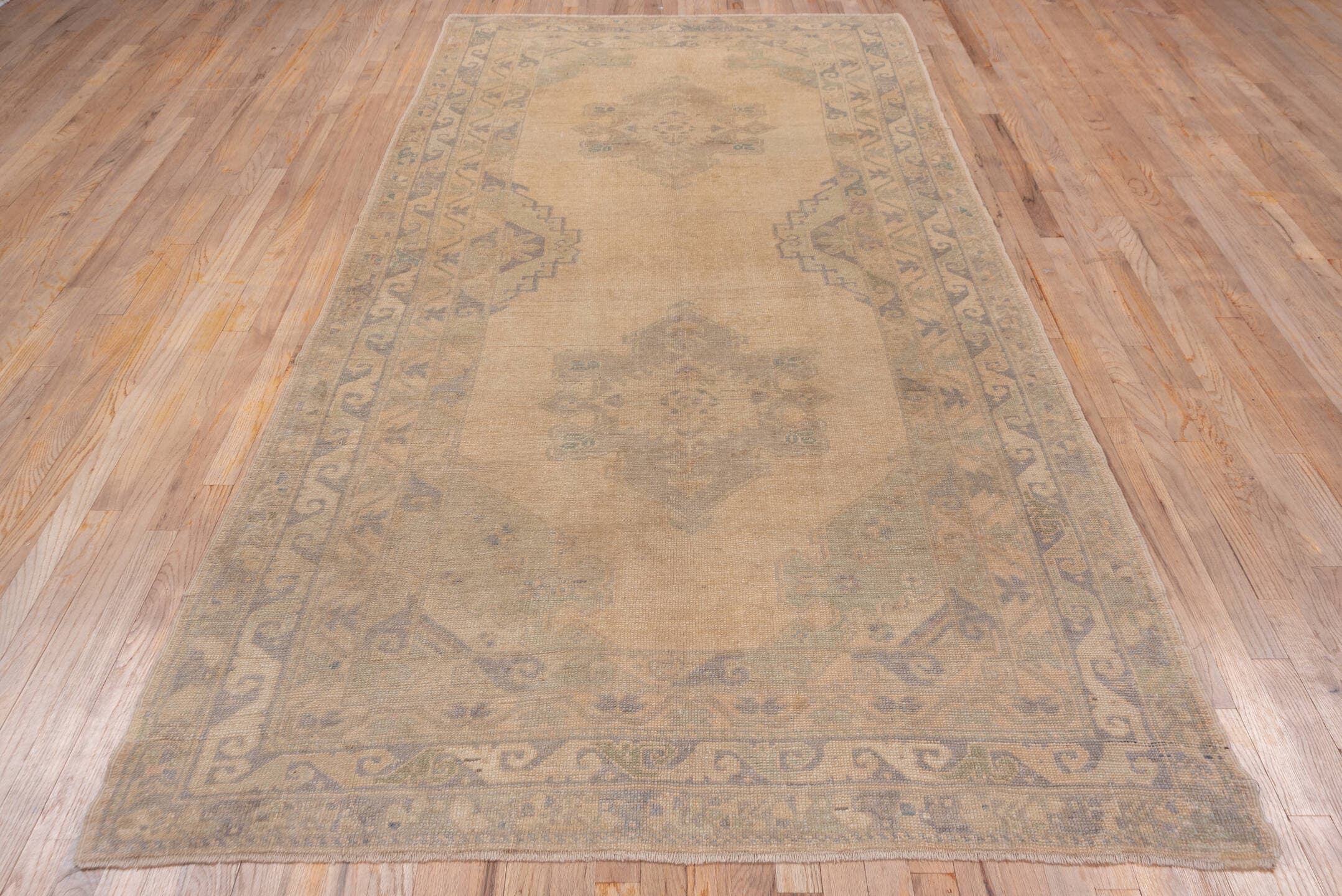 5' x 10' one-of-a-kind handmade vintage Oushak medium size rug. Color palette: beige, taupe, sage, dusty blue, camel, brown