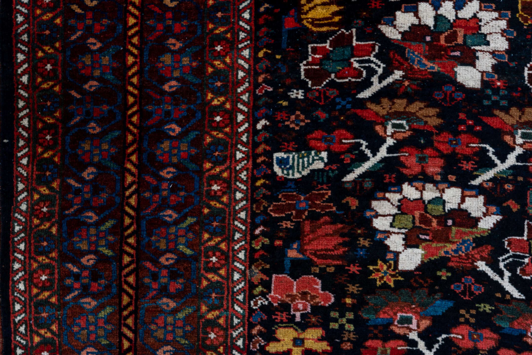 8' x 12' one-of-a-kind handmade antique Shiraz large size rug. Color palette: burgundy, ebony, crimson, ivory, indigo, rust