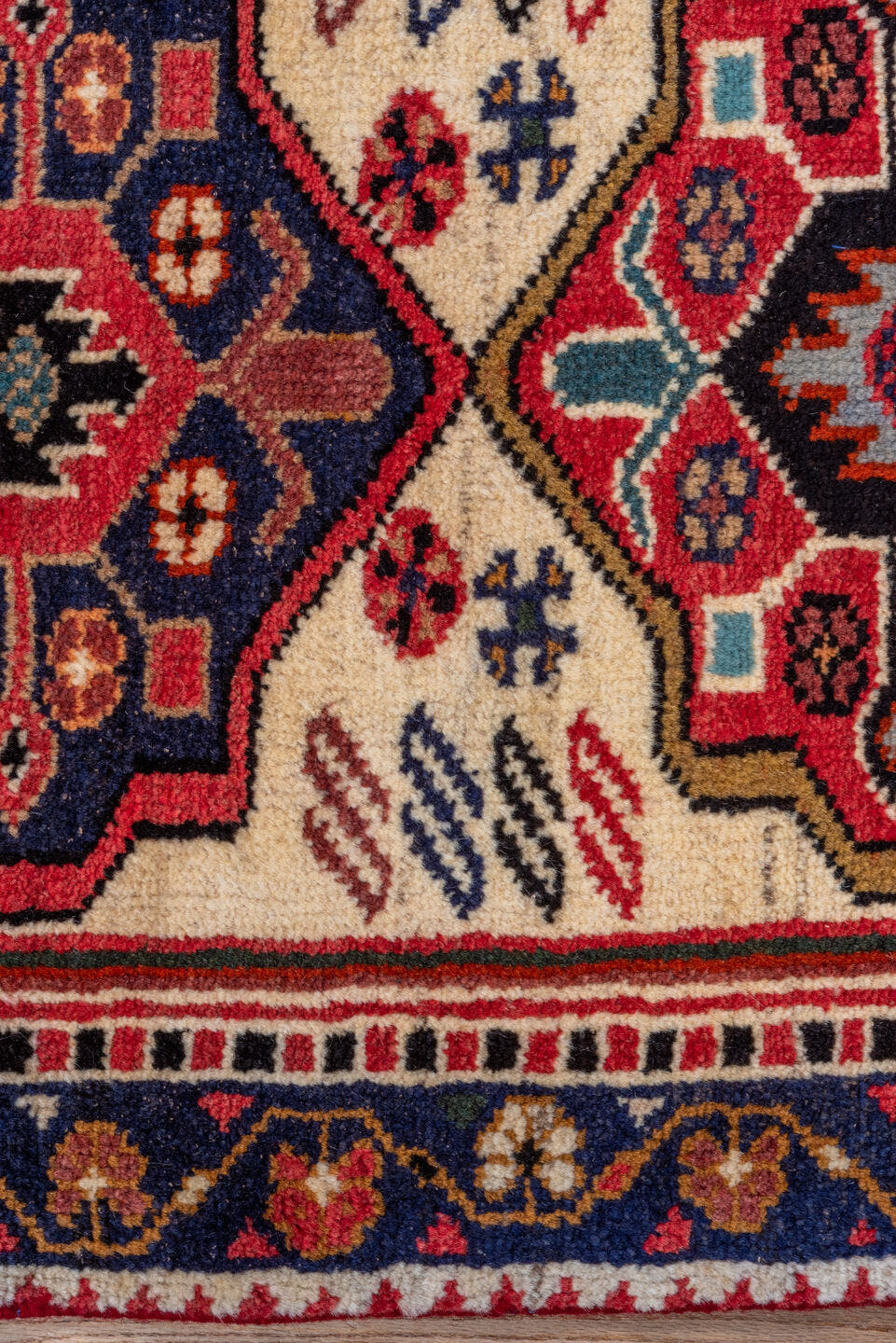2' x 10' one-of-a-kind handmade vintage Veece runner rug. Color palette: ivory, navy, rust, rose, crimson, camel, charcoal