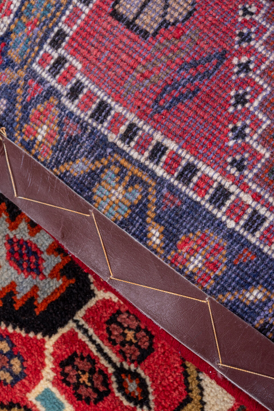 2' x 10' one-of-a-kind handmade vintage Veece runner rug. Color palette: ivory, navy, rust, rose, crimson, camel, charcoal
