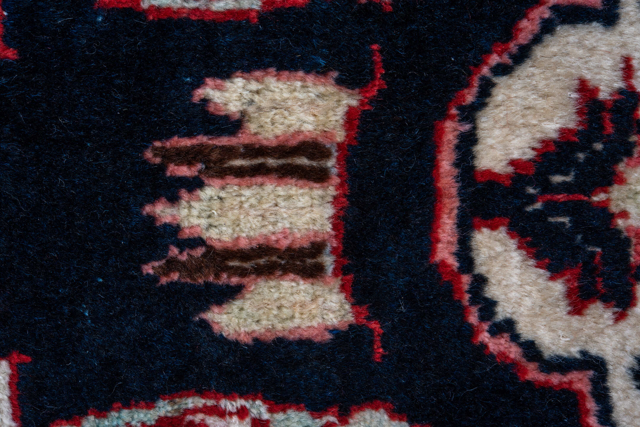 4' x 10' one-of-a-kind handmade vintage Mahal runner rug. Color palette: arapawa, black, blue, brown, gray, pink, red