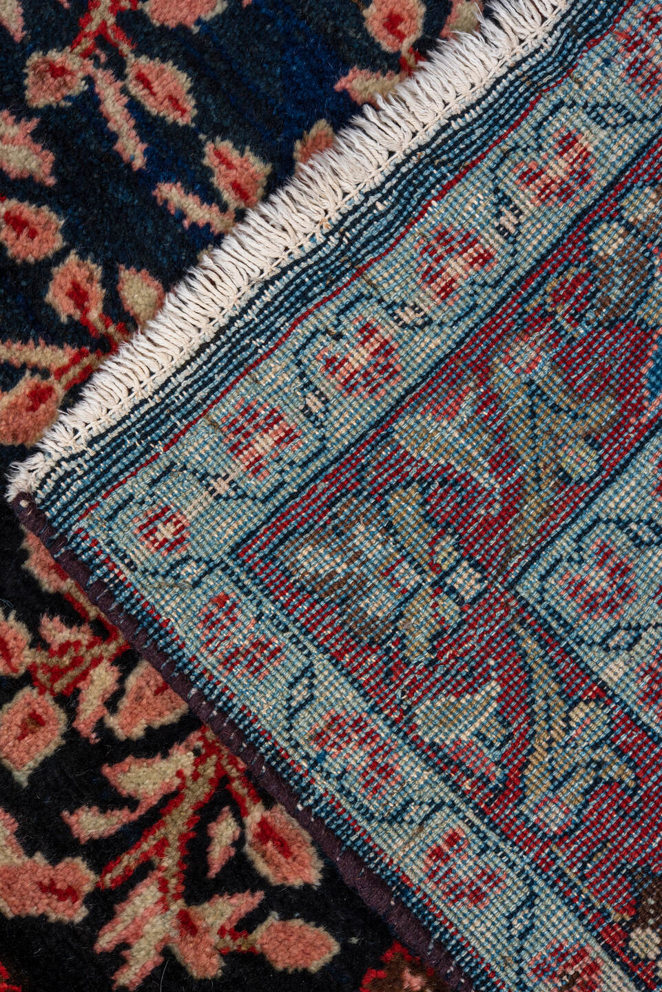 4' x 10' one-of-a-kind handmade vintage Mahal runner rug. Color palette: arapawa, black, blue, brown, gray, pink, red