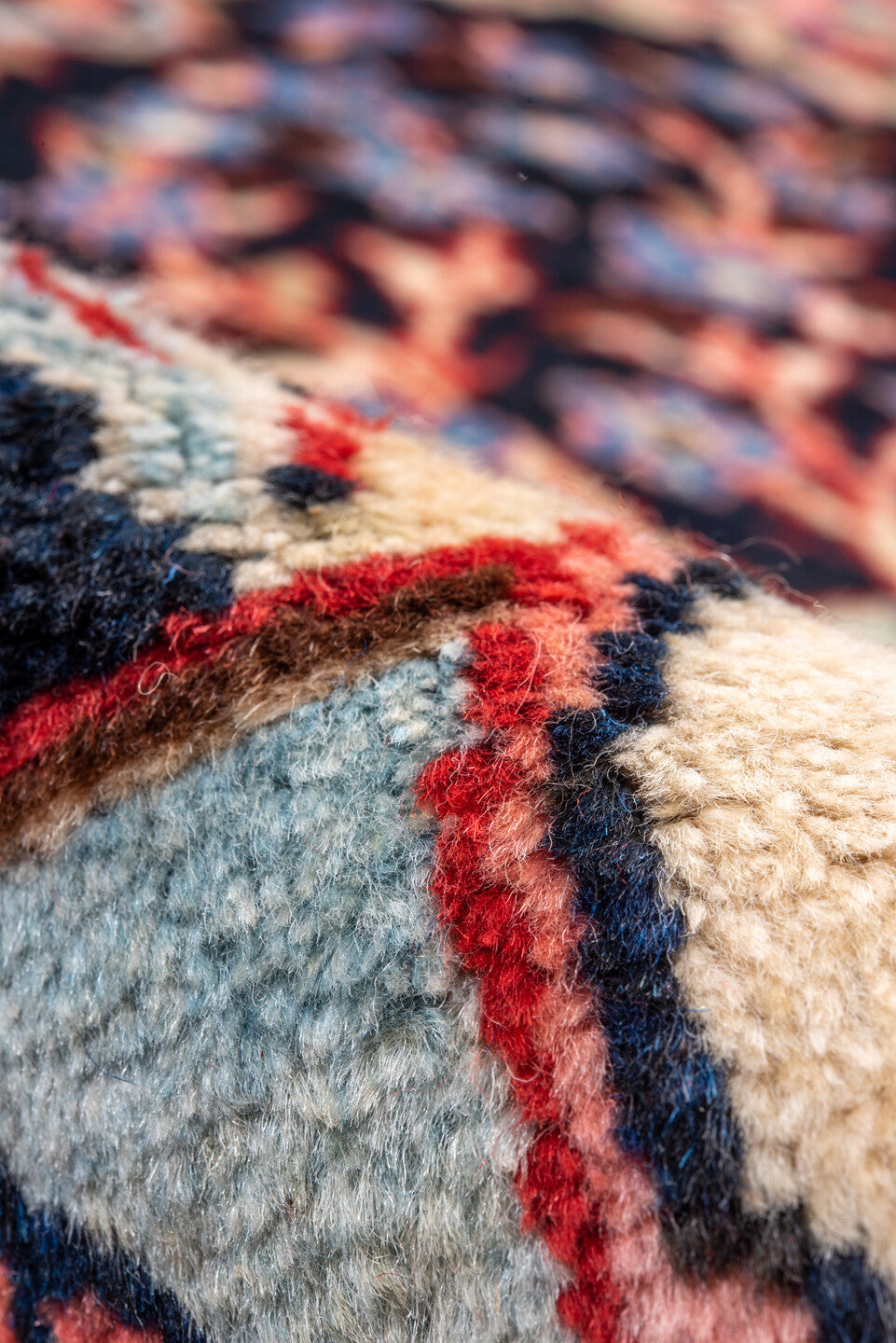 4' x 10' one-of-a-kind handmade vintage Mahal runner rug. Color palette: arapawa, black, blue, brown, gray, pink, red
