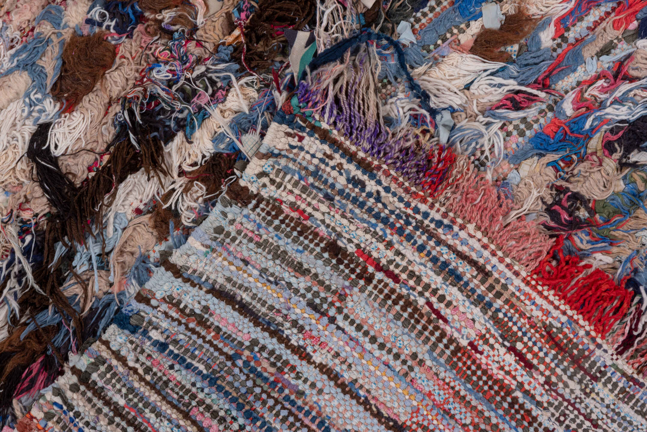 2' x 6' one-of-a-kind handmade vintage Rag Rug runner rug. Color palette: blue, brown, gray, light blue, light gray