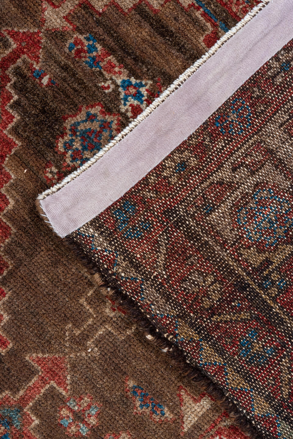 4' x 7' one-of-a-kind handmade vintage Malayer rug. Color palette: brown, rust, ivory, blue, red, camel, terracotta, beige