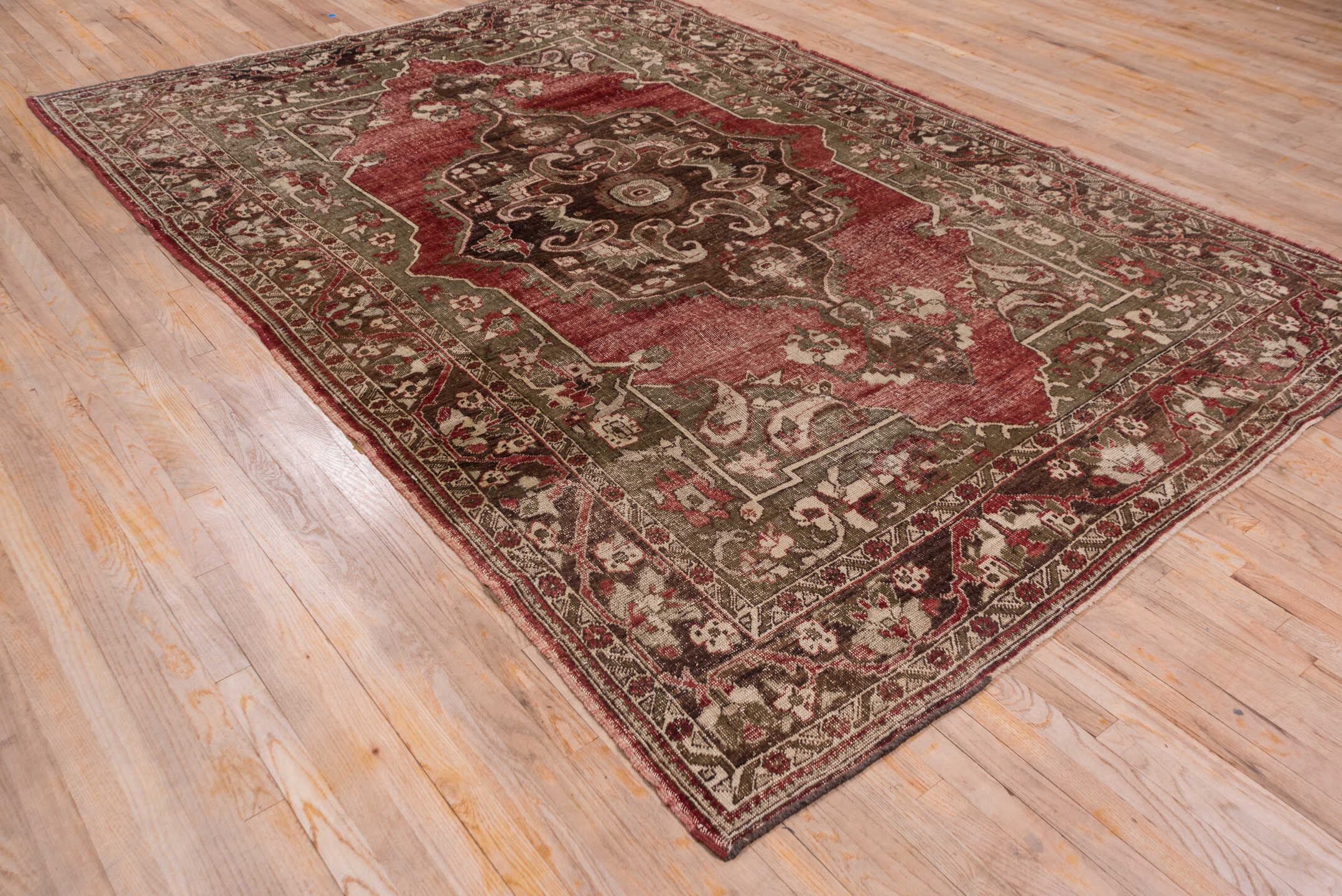 7' x 10' one-of-a-kind handmade vintage Oushak large size rug. Color palette: brown, pink, red, redwood